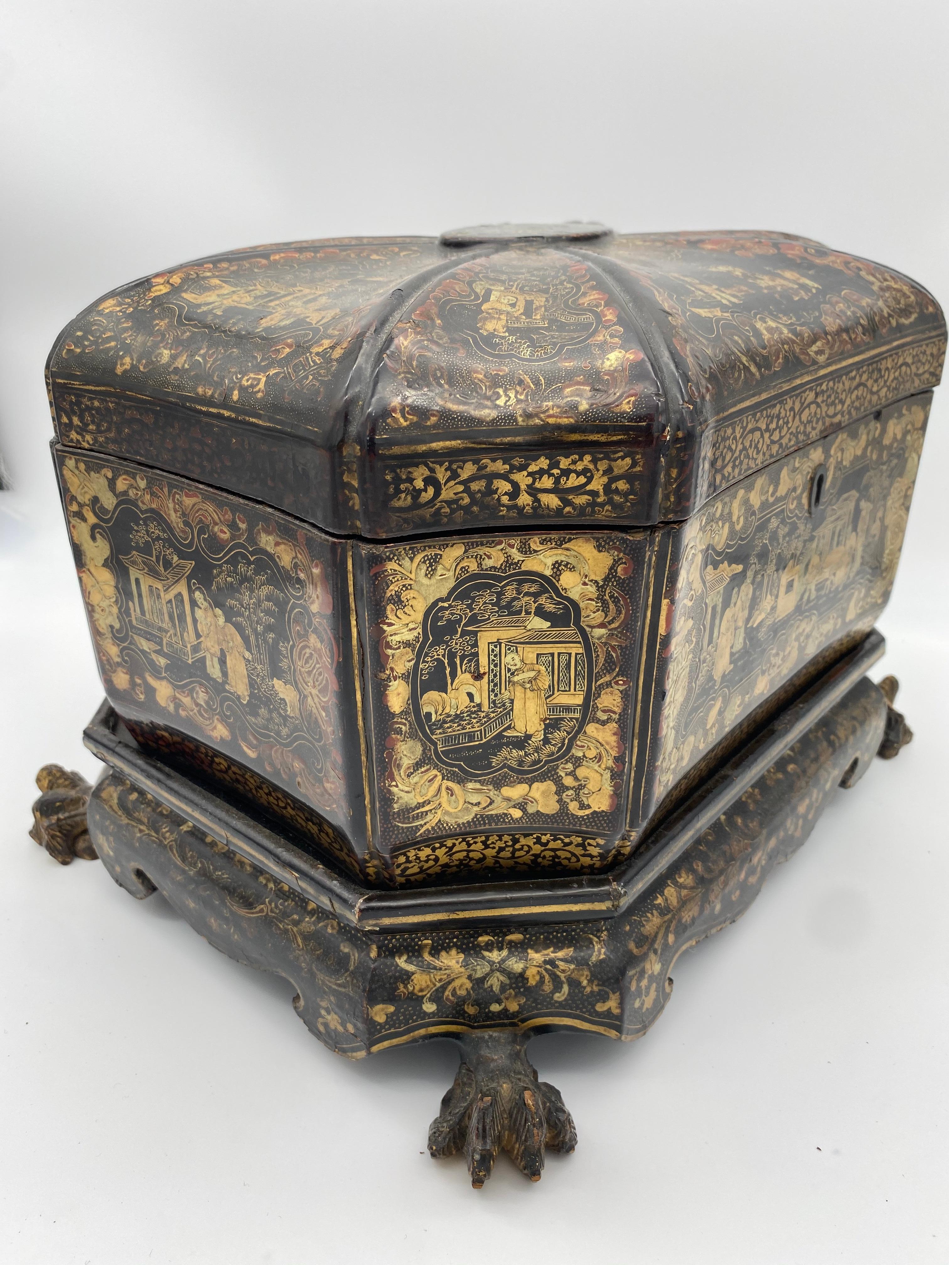 Middle 19th century Chinese Export double lacquer tea caddy on stand  from the Qing dynasty. octagonal form with hinged lid ,divided interior with metal caddies , mounted on conforming base with carved paw feet ,H10'',W14'',D11'', Decorated all over