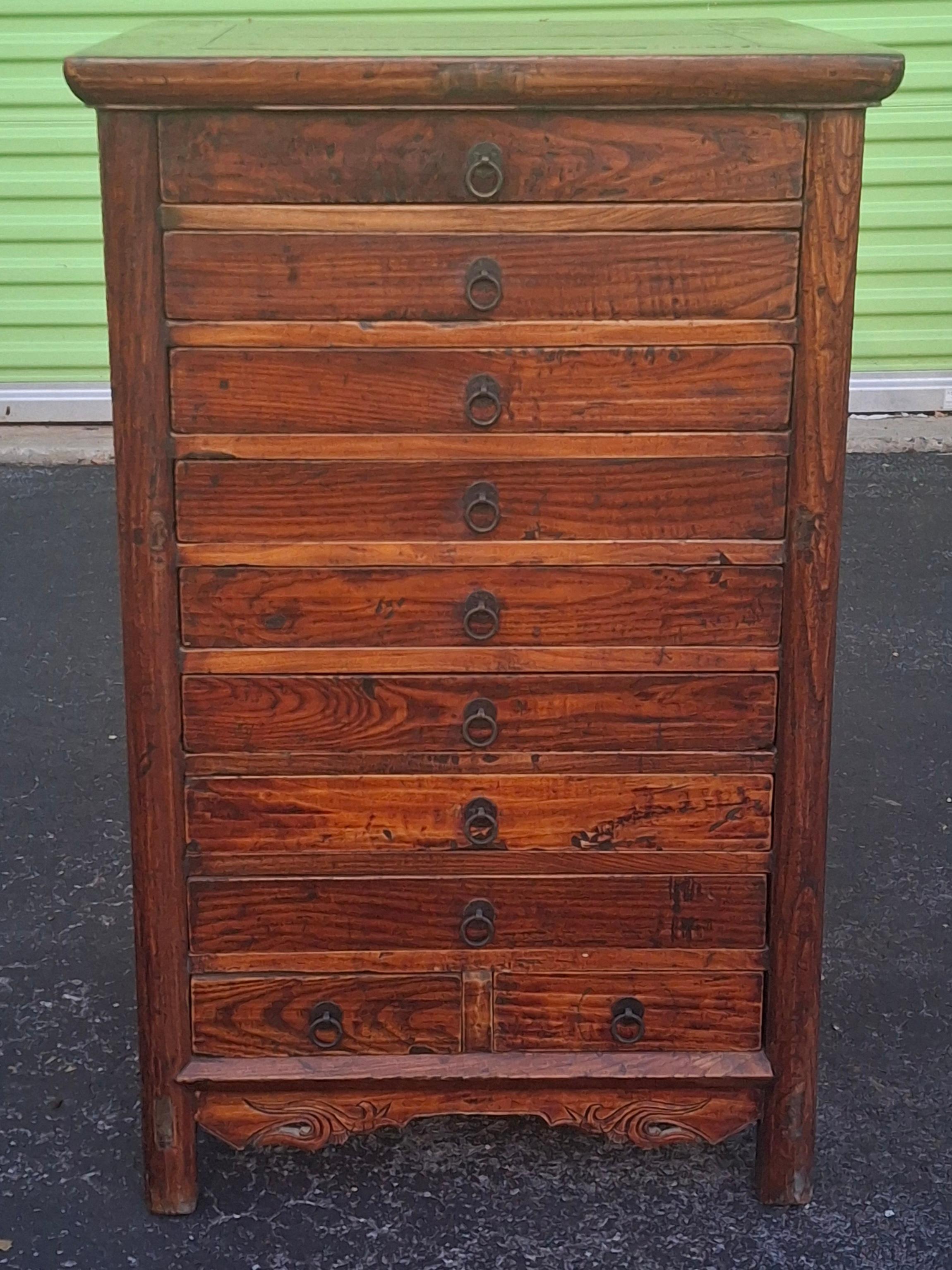 A Mid 19th Century Chinese Lacquered Elmwood Ten-Drawer Document Chest. Measures: 22.5