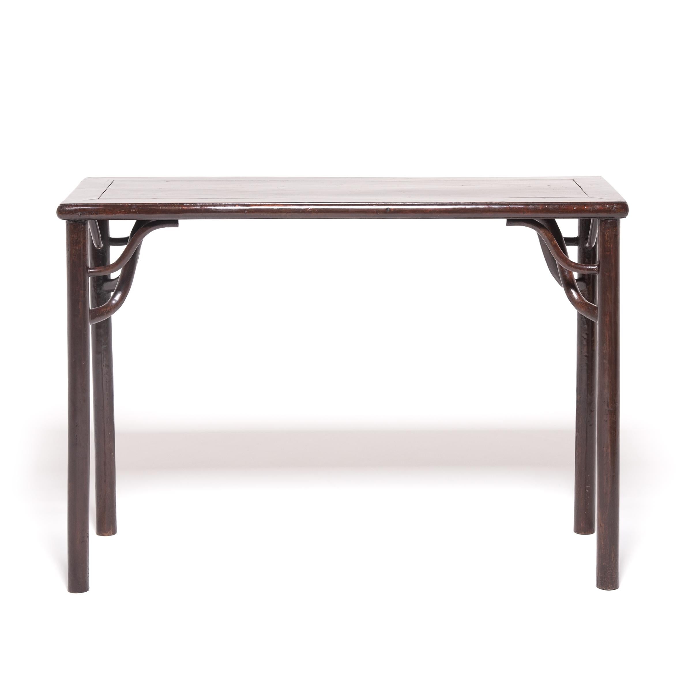 A tradition dating back to the Northern Song dynasty, 960 to 1126 AD, wine tables have been used for centuries at social gatherings as a spot to converse, sip wine, and make toasts. This 19th century elmwood table celebrates this time-honored