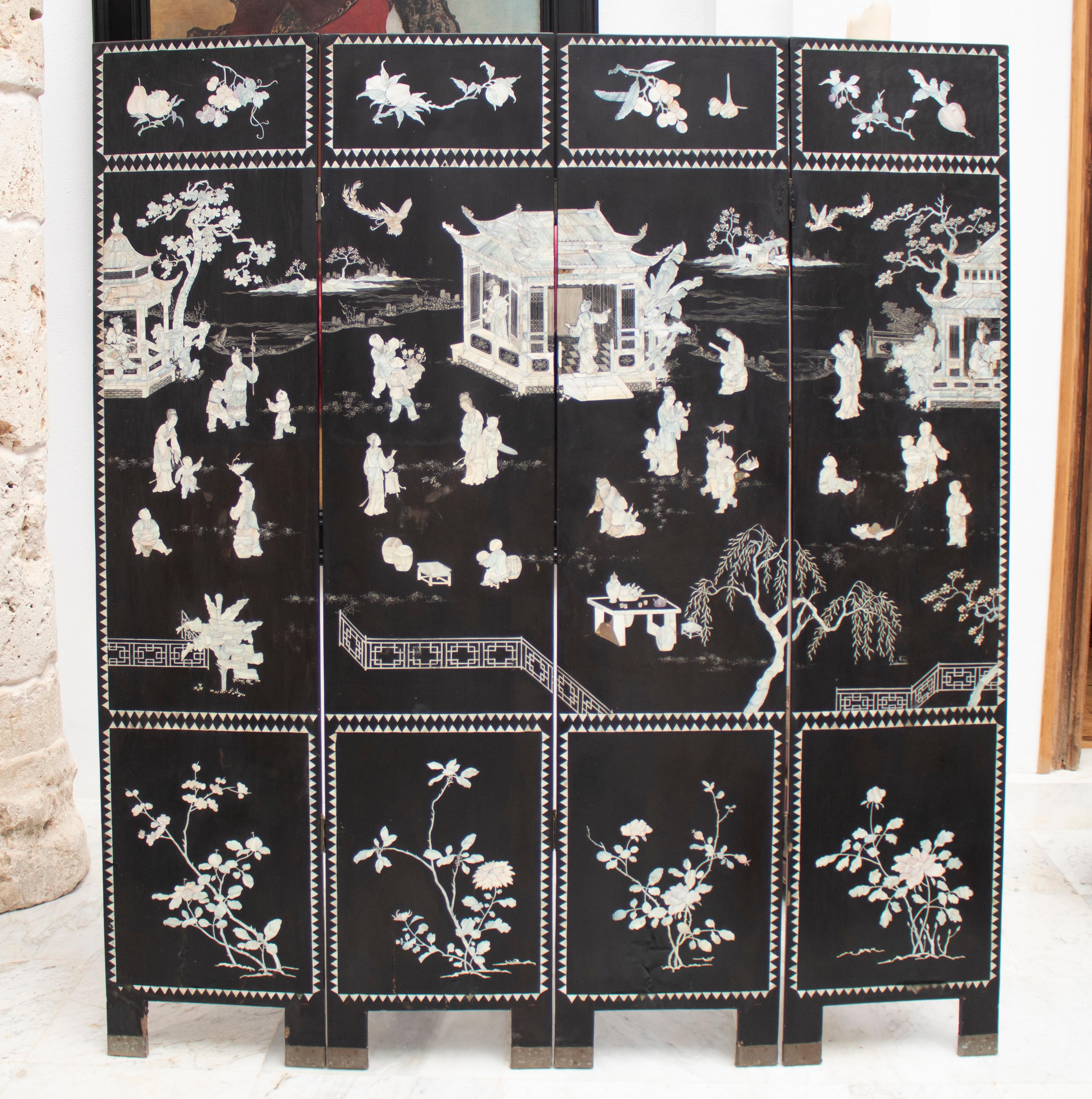 20th century Chinese black lacquered 4-panel folding screen decorated with mother of pearl inlay drawings. Has defects.

  
