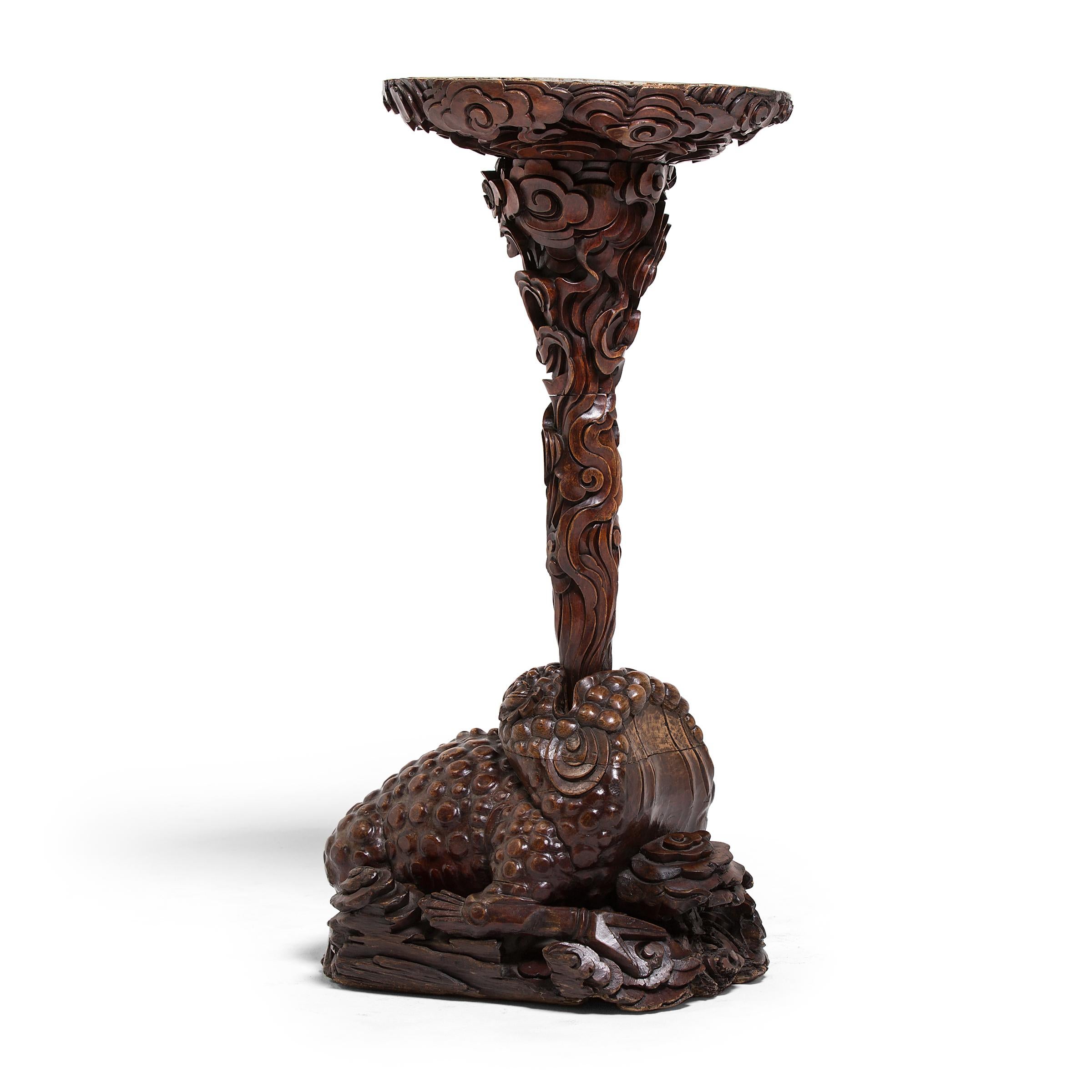 This 19th century incense stand is intricately carved in the form of a mythical three-legged toad, a potent symbol of luck and prosperity. Known as the Jin Chan, or Money Toad, this mythical amphibian is the animal companion of Daoist immortal Liu