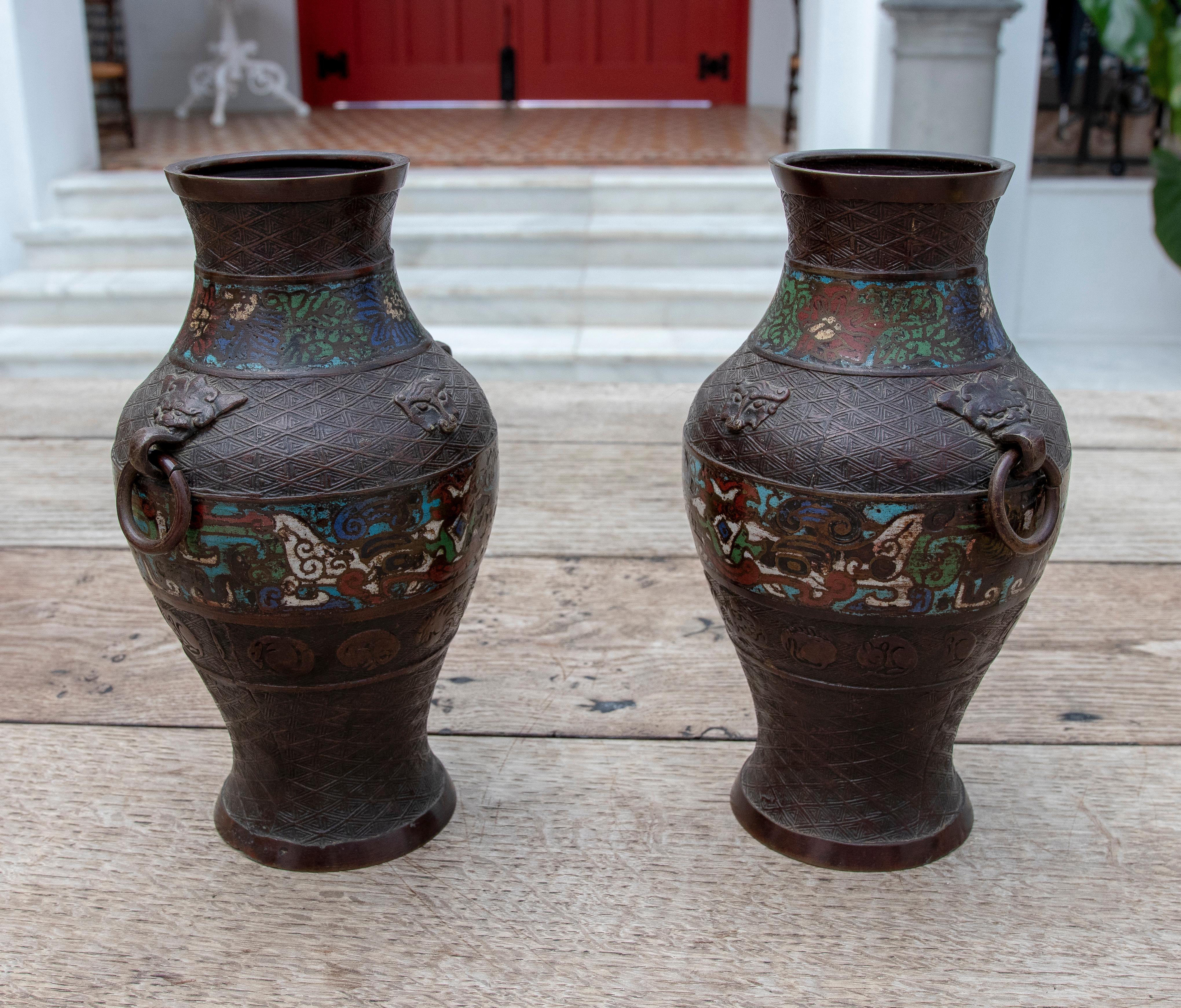 19th Century Chinese pair of bronze vases with Cloissoné Technique.