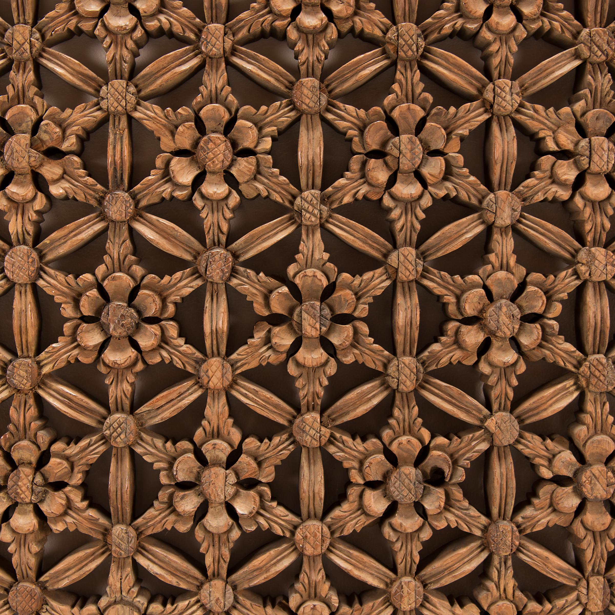 This lattice window panel likely originated in an aristocratic Chinese home with neutral and balanced interiors. The intricate latticework was designed to allow light and air into a room while maintaining privacy. Creating lattice was a puzzling
