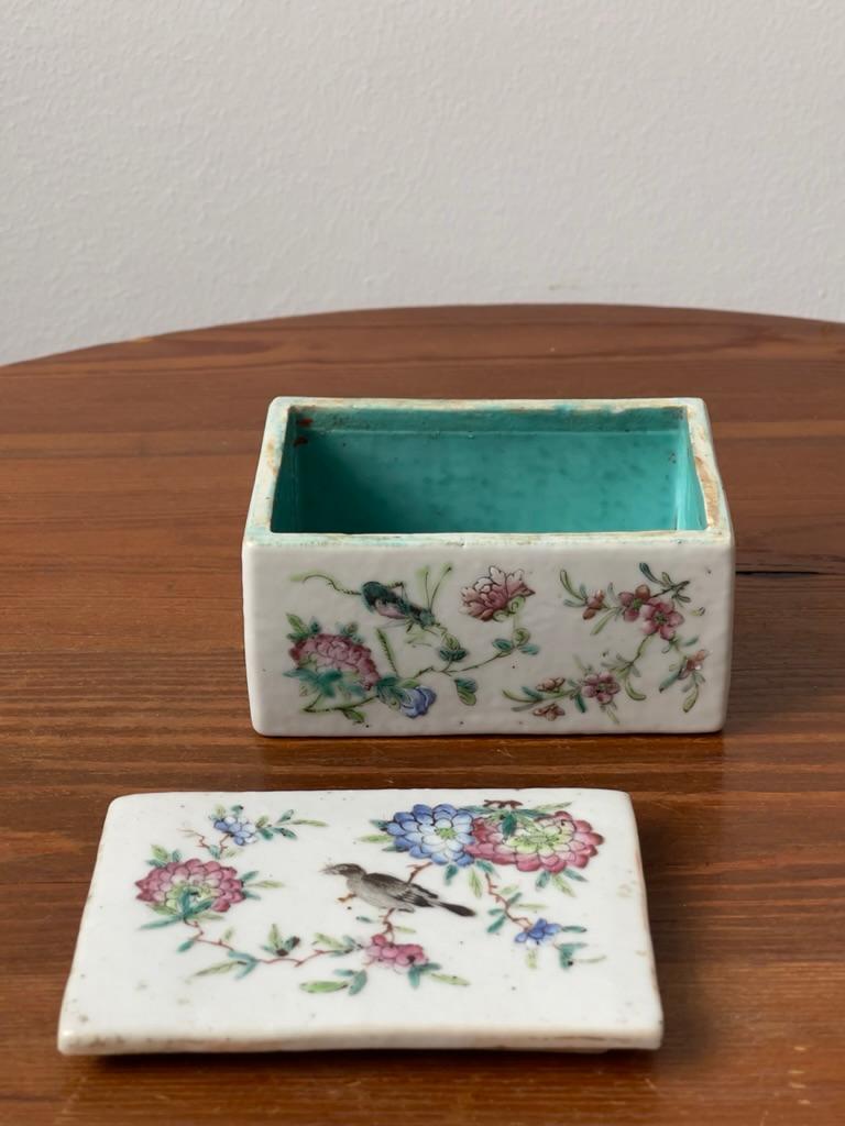 19th century Chinese porcelain family box with hand painted bird motiv and light blue interior. Very good condition.