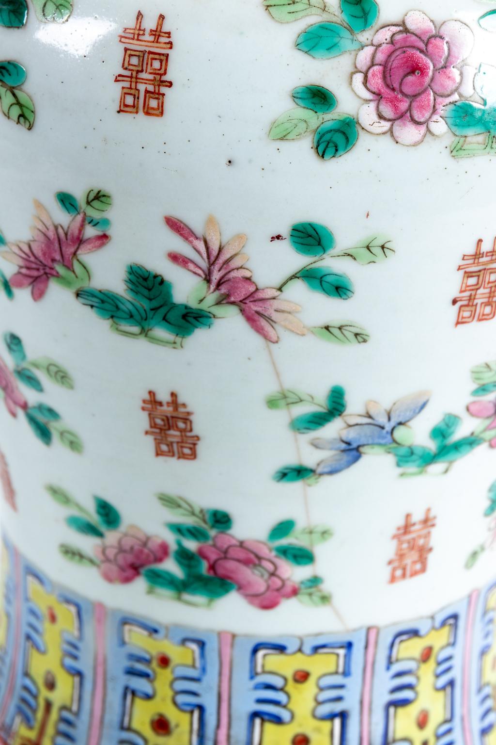 Chinese porcelain multi-color vase with floral motifs, circa 19th century. Please note of wear consistent with antique age including patina and minor paint loss.