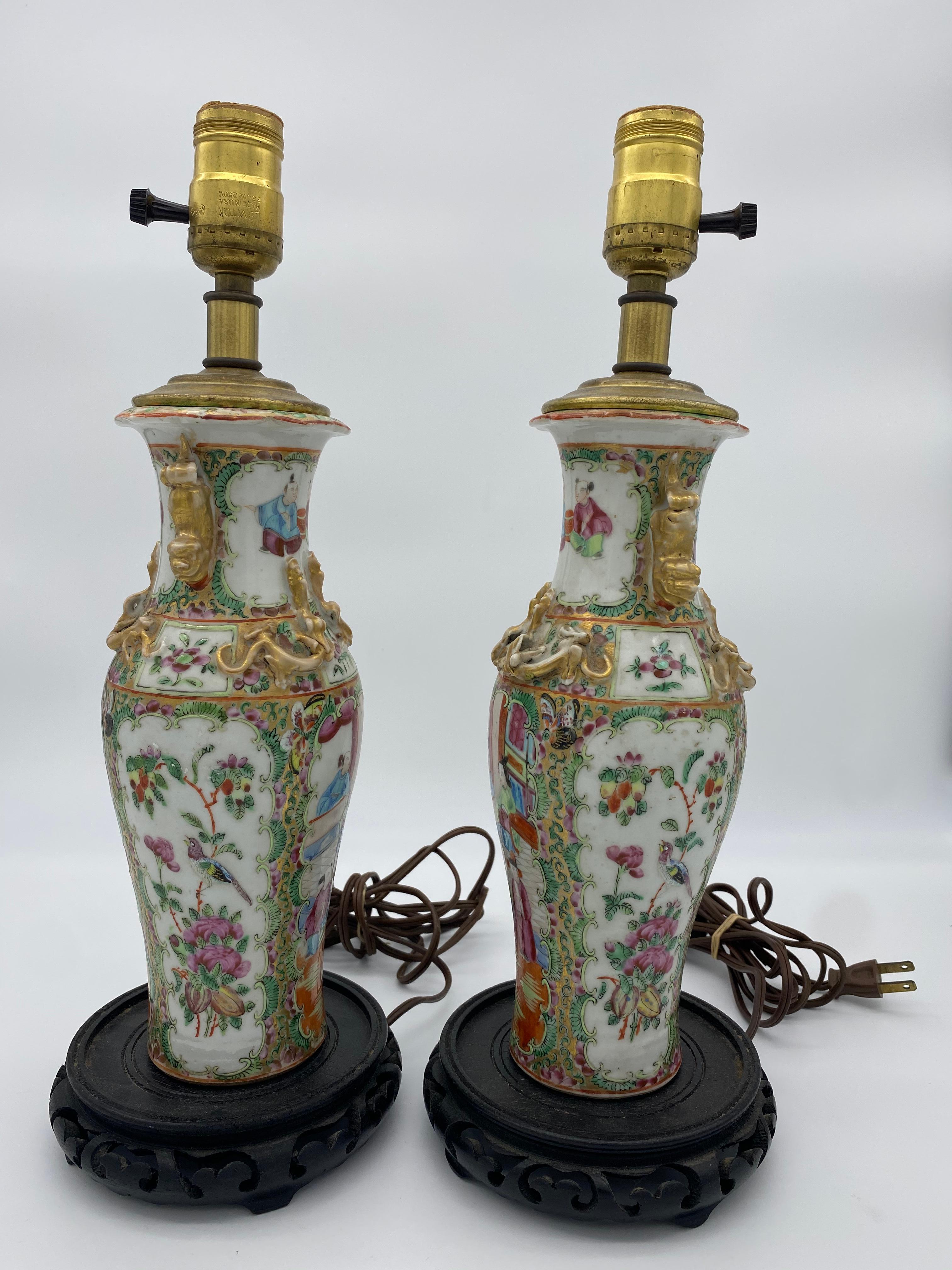 19th century Chinese porcelain vase now mounted as lamps. Decorated with beautiful flowers and a family. Vase not including lamp is 10 inches tall.