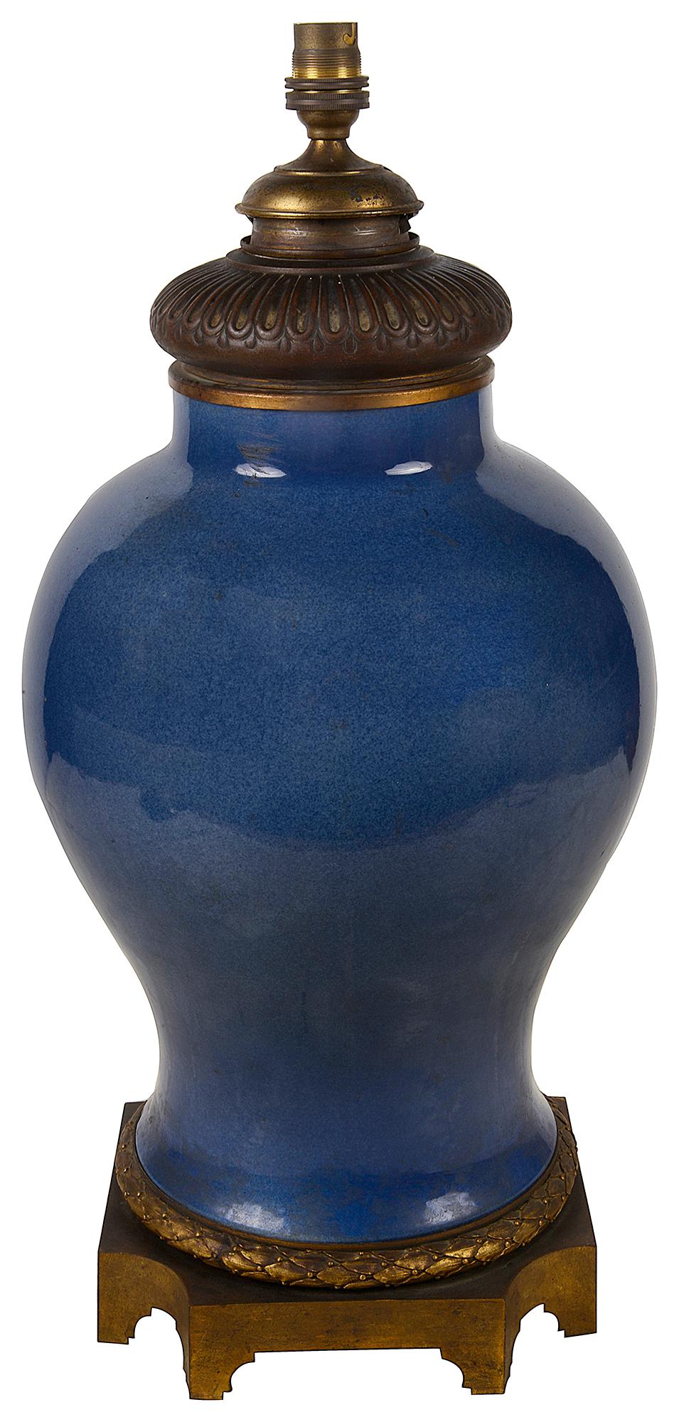 A striking 19th century Chinese power blue vase / lamp with French gilded ormolu mounts to the top and plinth base.