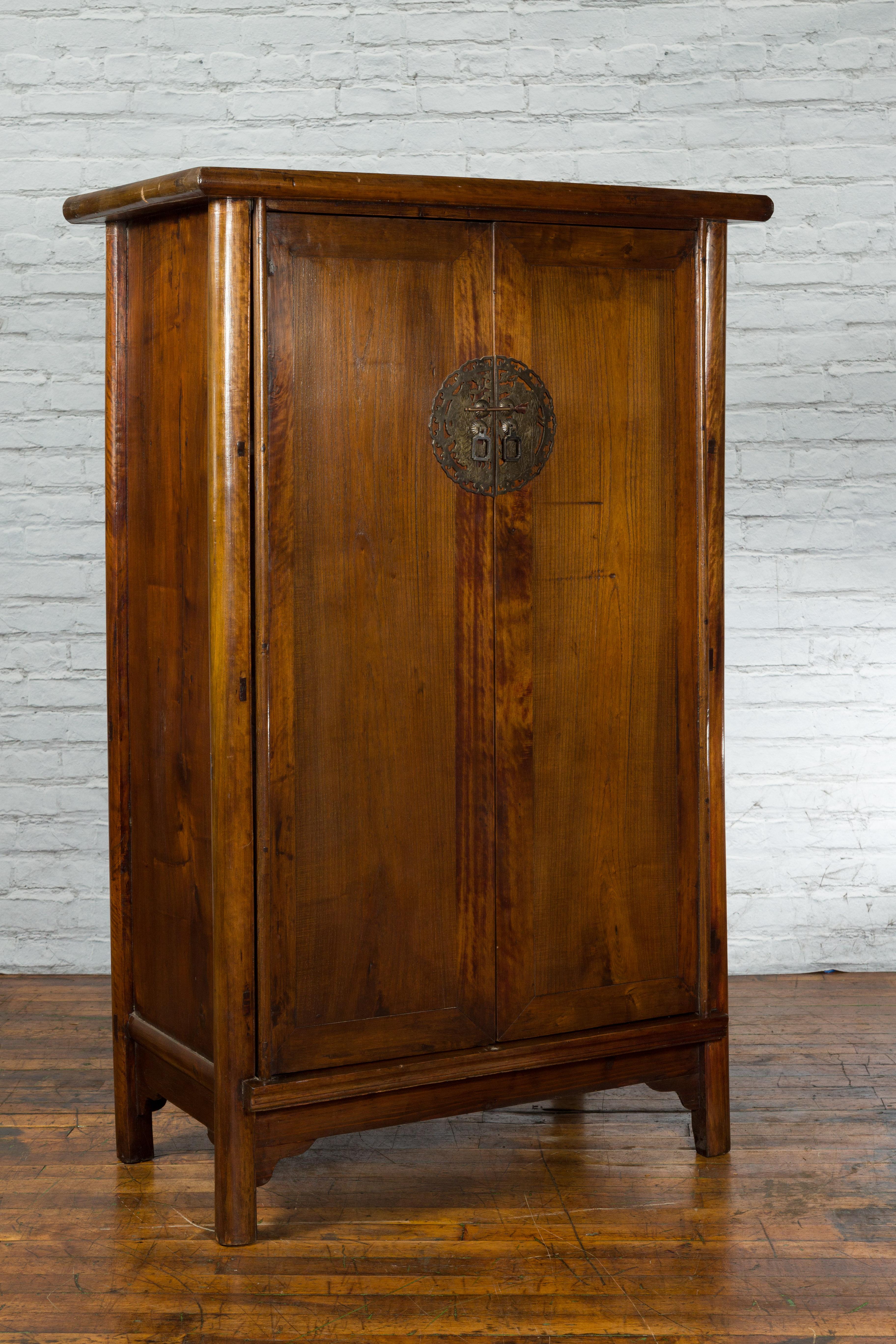 Carved 19th Century Chinese Qing Dynasty Period Wooden Cabinet with Bronze Medallion For Sale