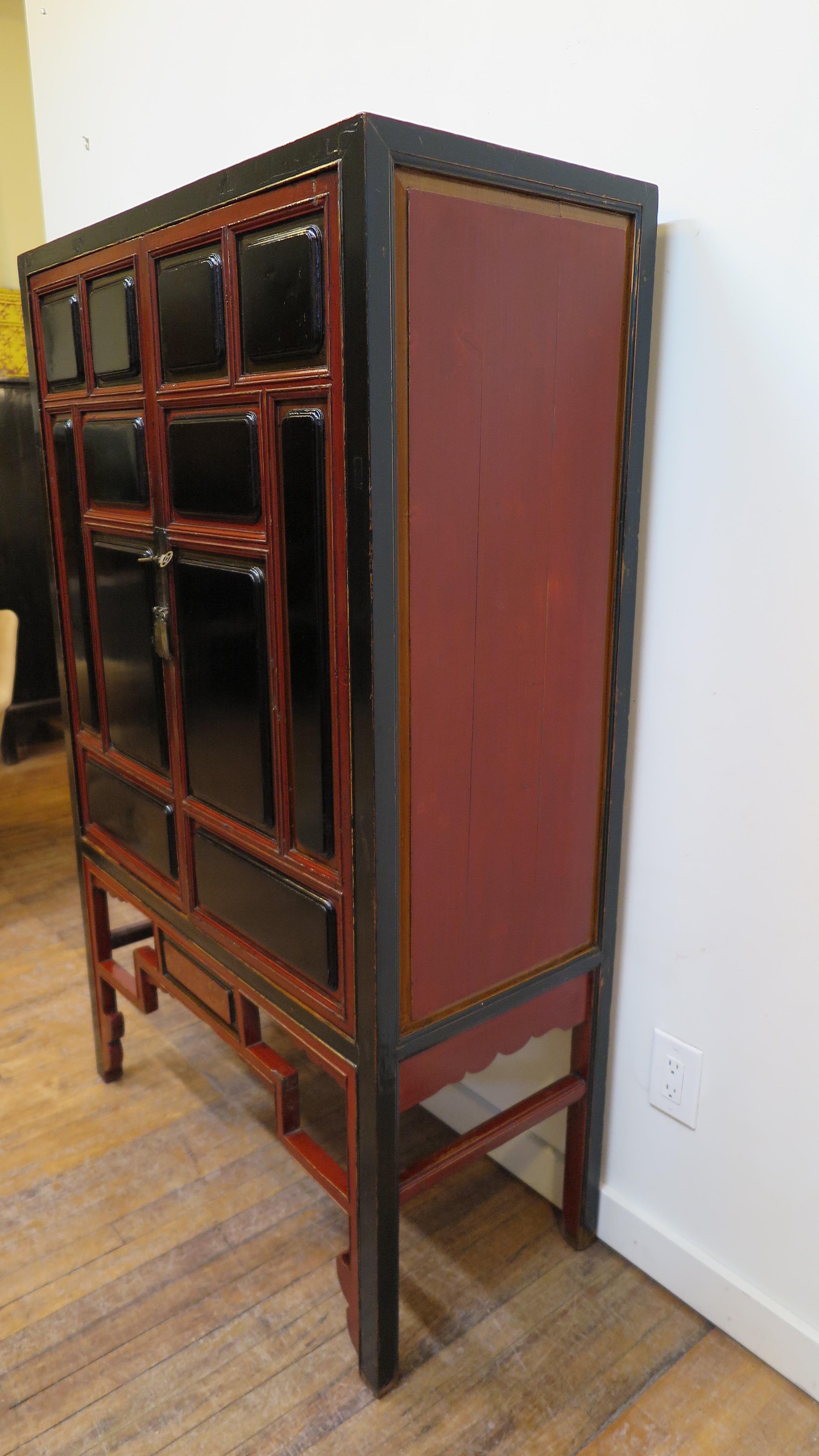 Lacquered 19th Century Chinese Raised Panel Cabinet For Sale