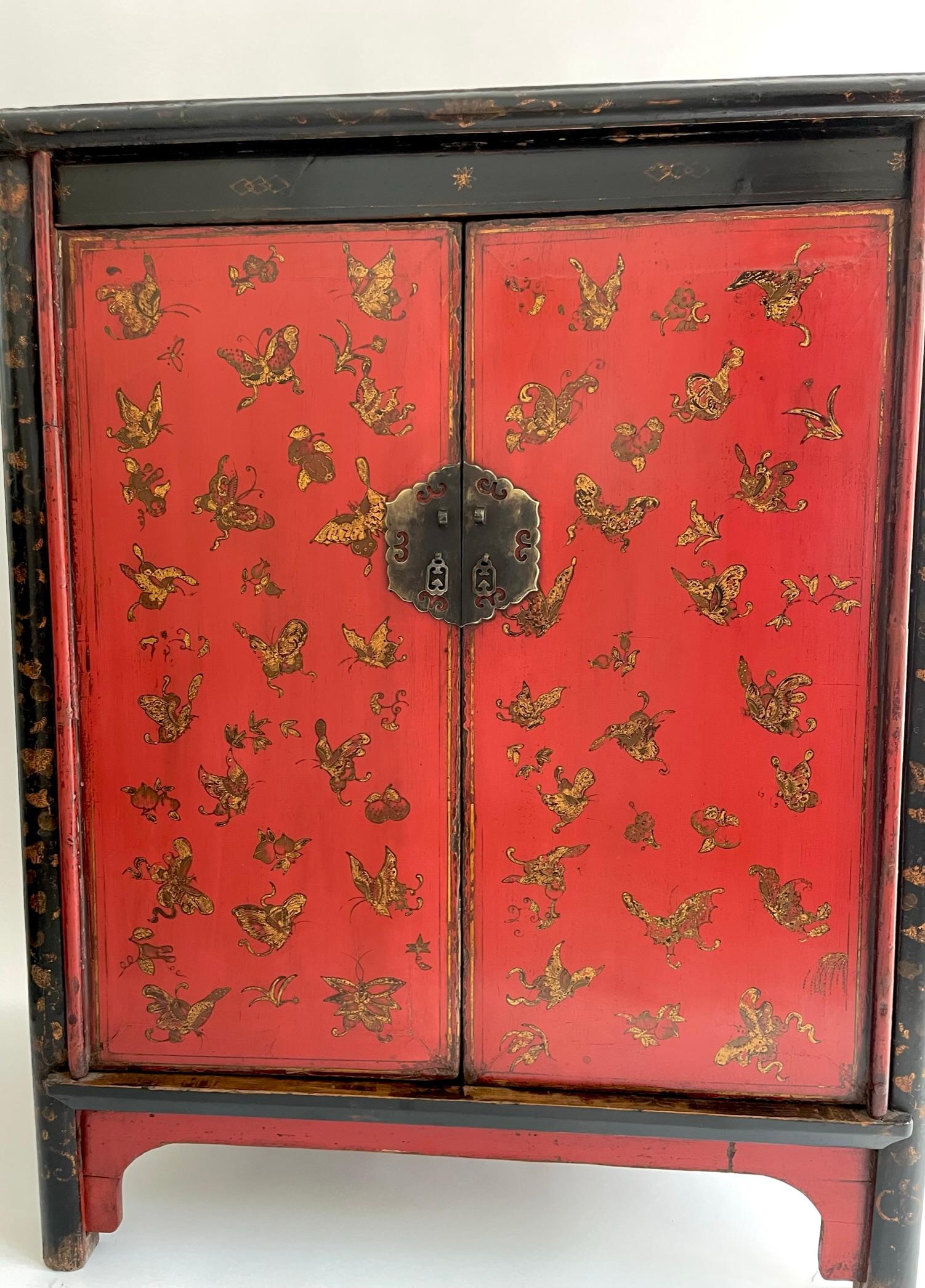 Hand-Carved 19th Century Chinese Red Lacquer Cabinet with Gilded Butterflies For Sale