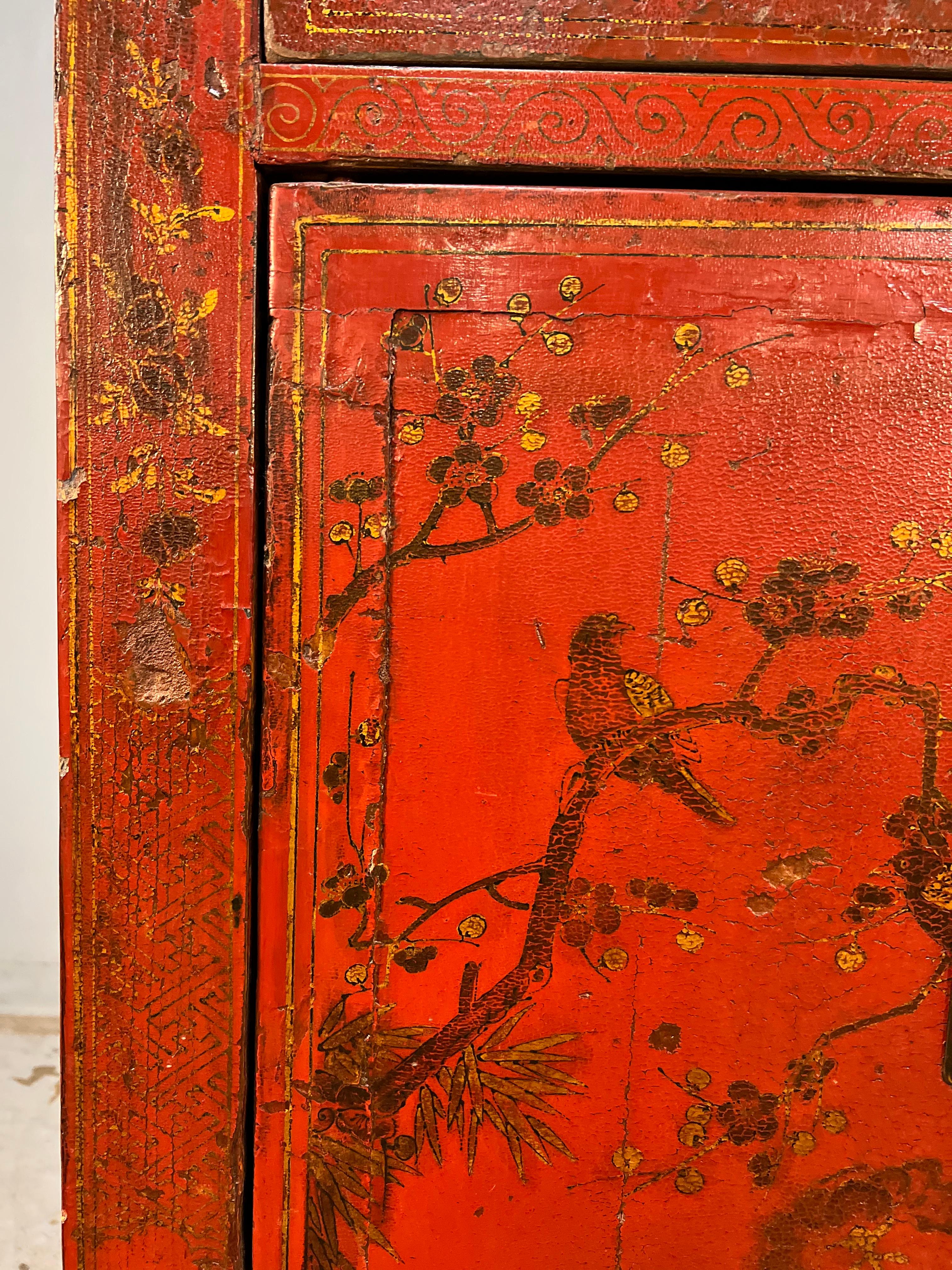 Cast 19th Century Chinese Red Lacquer Cabinet with Gilt Decoration For Sale