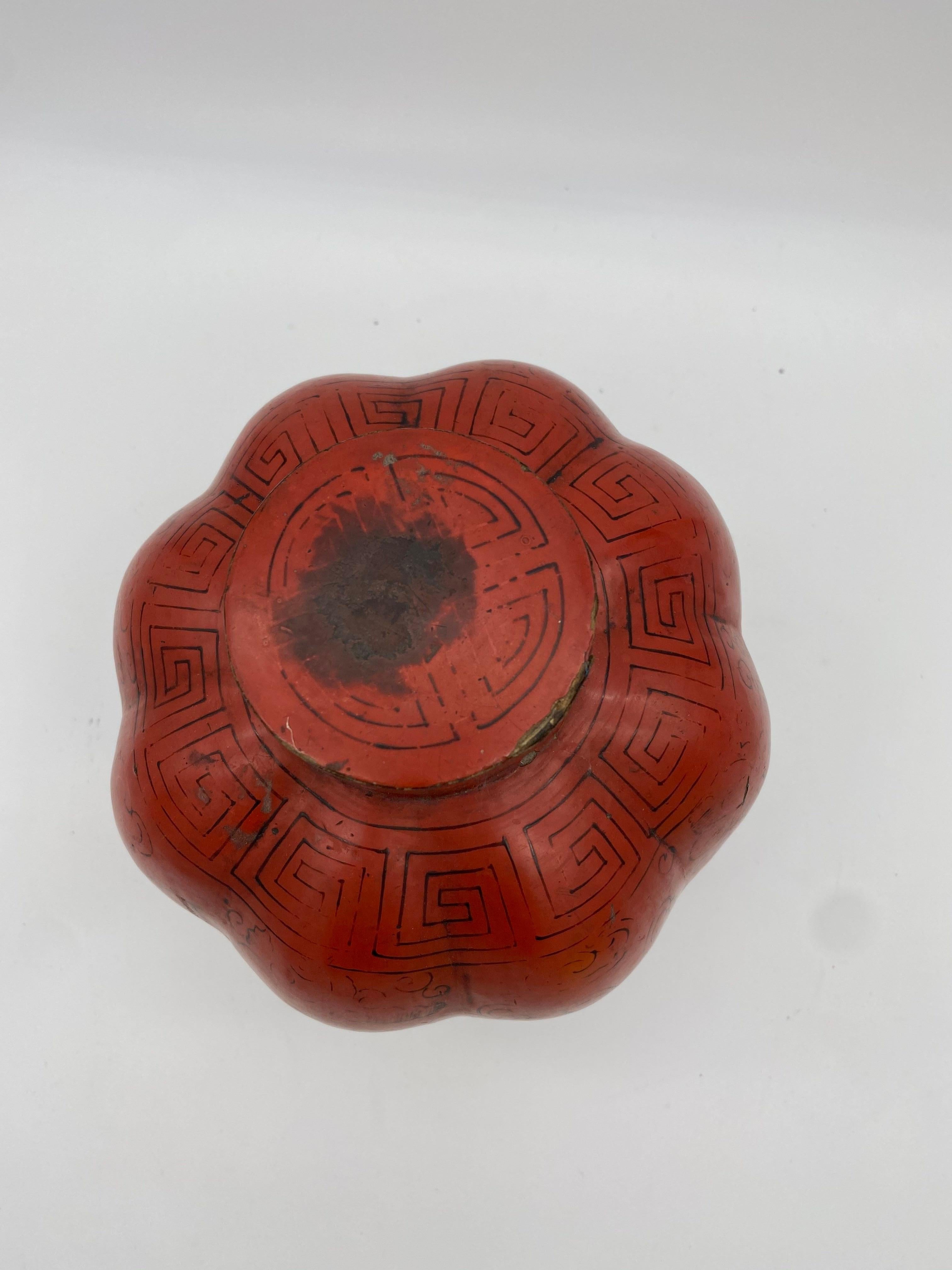 19th century Chinese red lacquered papier mâché melon form vessel with lift cover and painted decoration. Measures: H 9 1/2 inch.