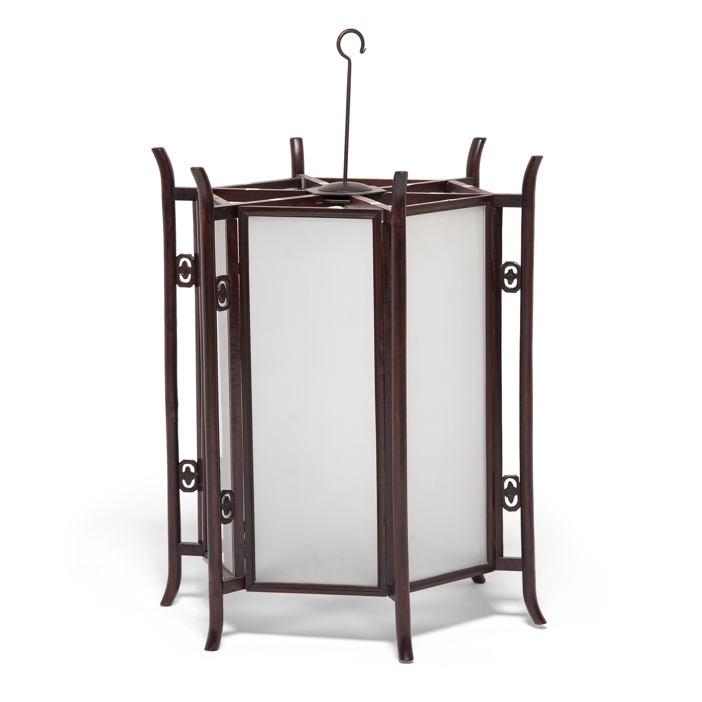 Elegantly constructed of thin pieces of fine hardwood, this ornate 19th-century lantern would have originally been lit with candles to illuminate a courtyard home in China's Anhui province.

Chinese lanterns have a history that goes back over 1,800