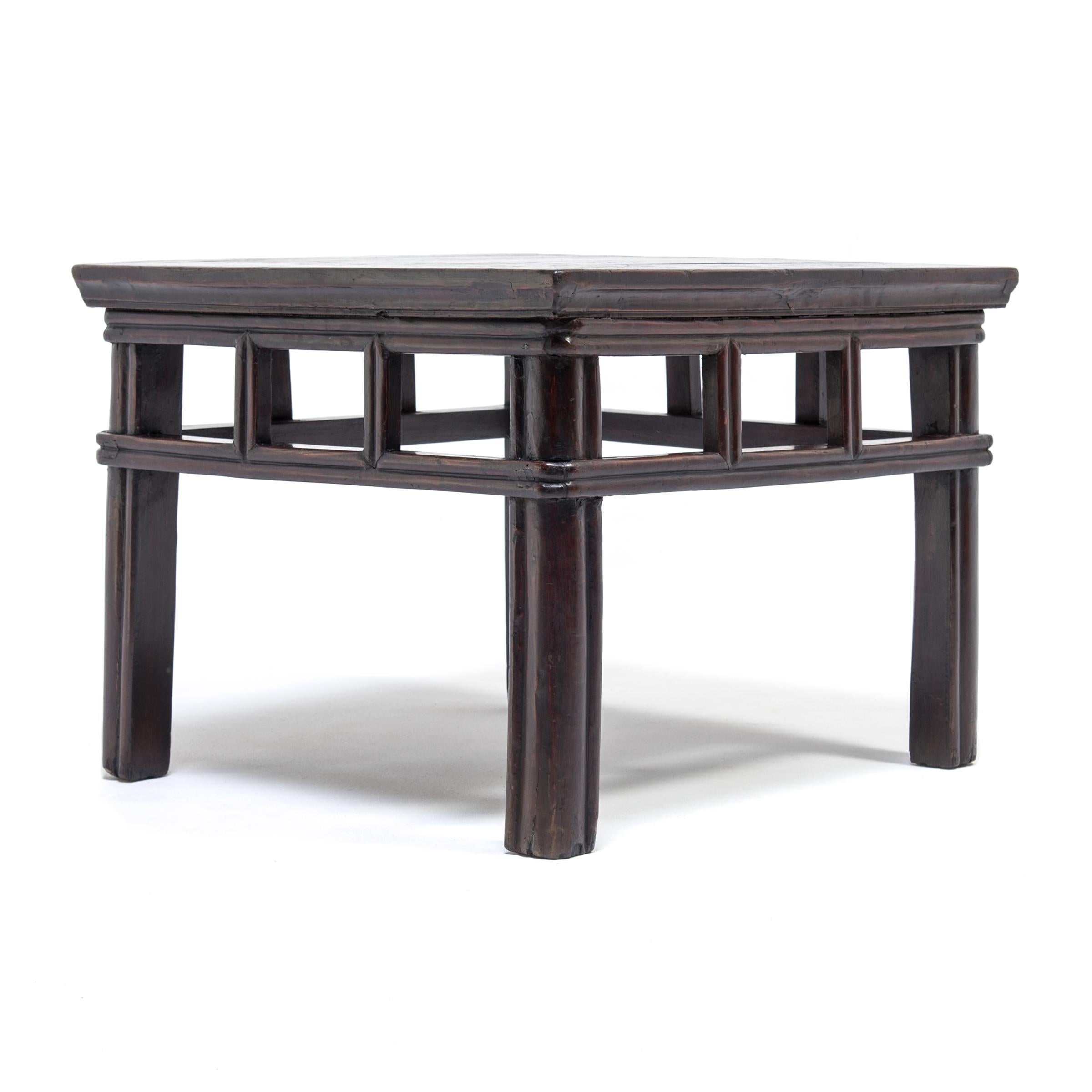 This mid-19th century fang deng (square stool) was made in Hebei province and crafted of elm foraged from the forests of northern China. The stretchers encircling the outer edges of the rounded legs highlight the masterful carpentry employed to
