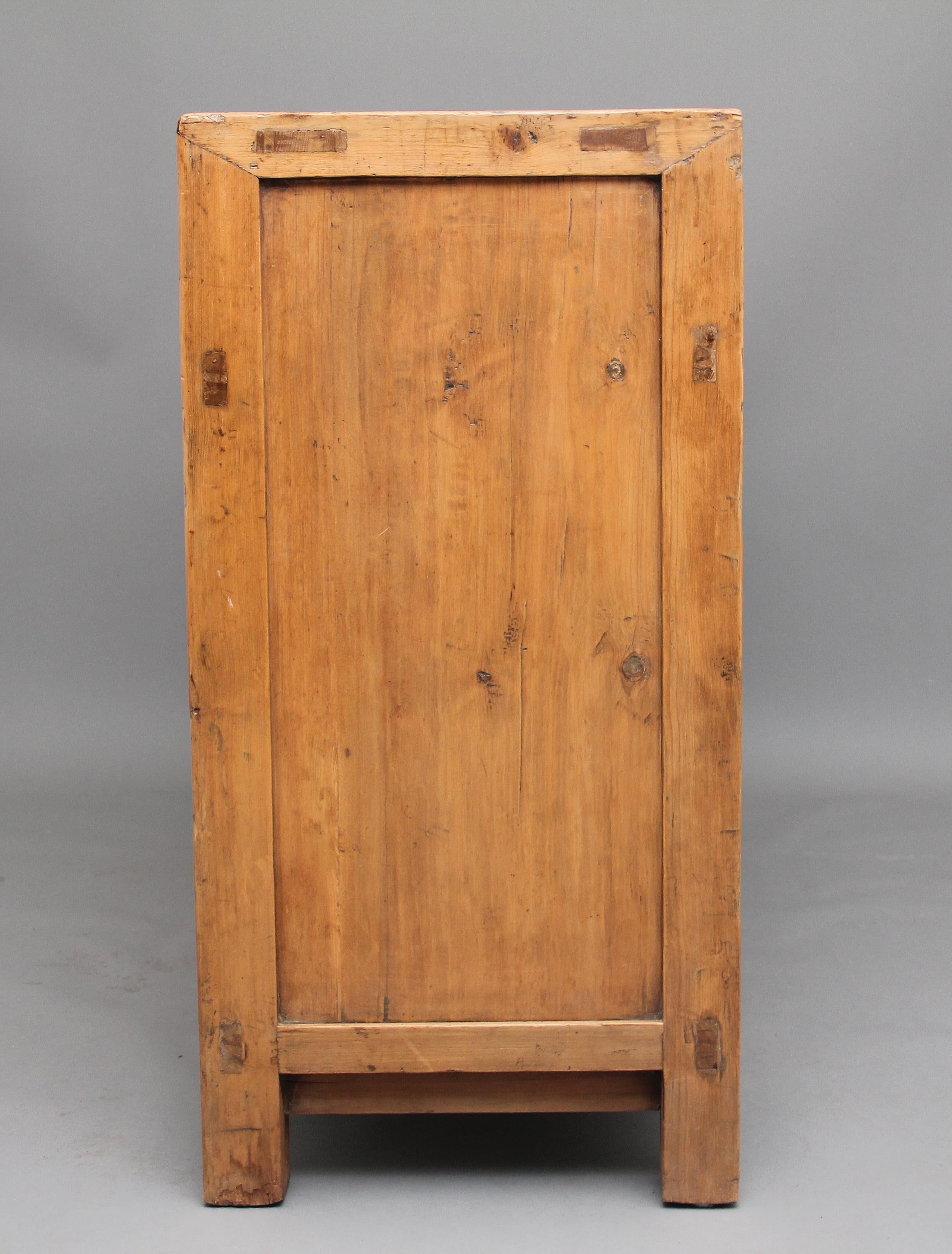 Pine 19th Century Chinese rustic pine dresser with three drawers / two door cupboard