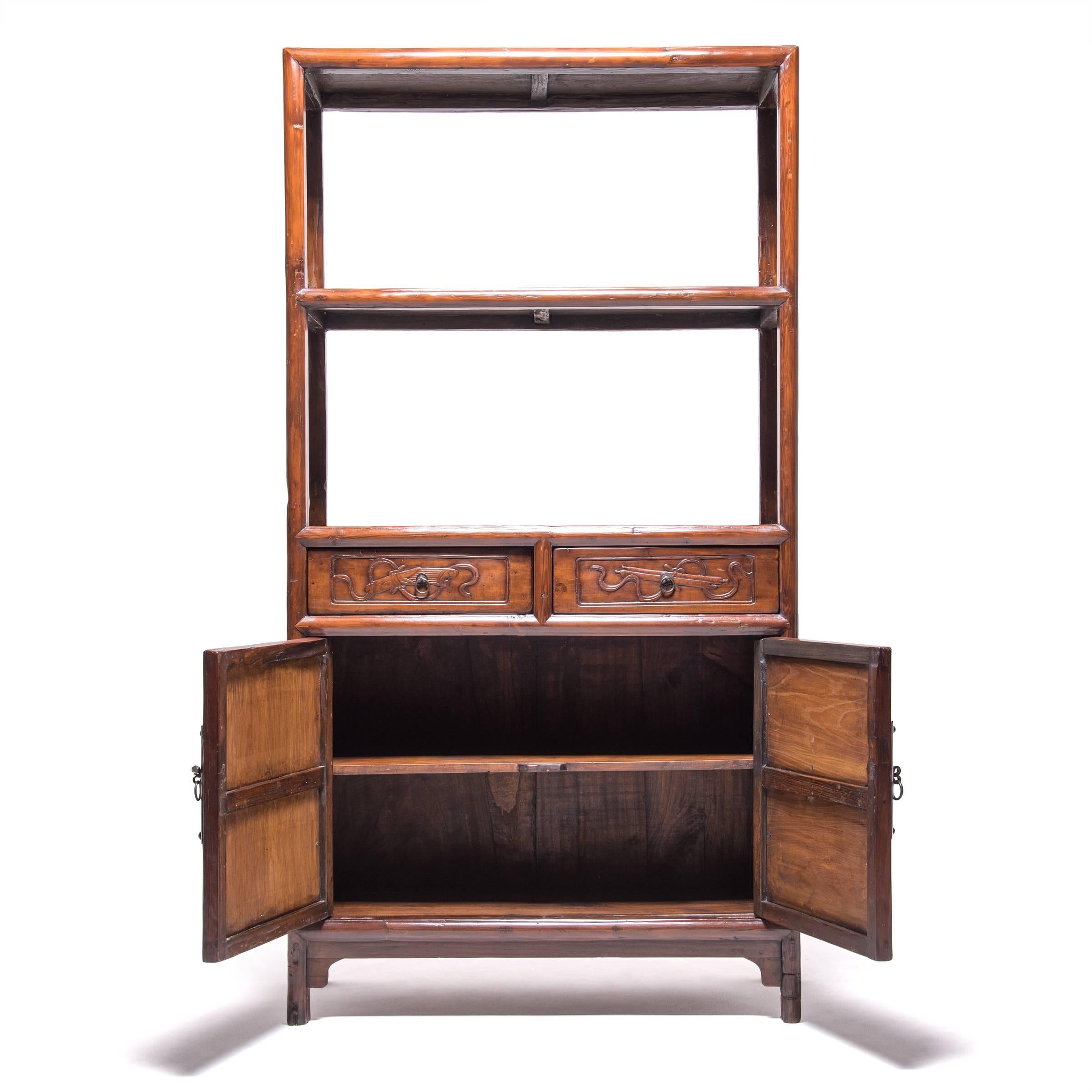 Collecting was a popular pastime for well-to-do Ming and Qing dynasty gentleman, and a shelf like this one would have been an ideal place to display jades, curios, porcelain, and collectibles. This shelf was made out of elmwood over 150 years ago in