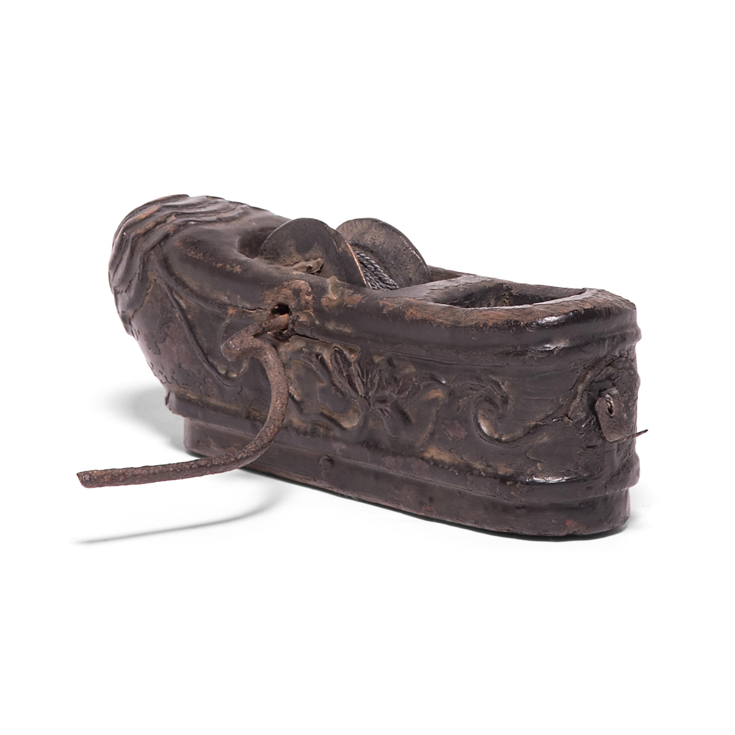 Given the beauty and thoughtful design of traditional Chinese furniture, it’s no wonder that Qing-dynasty carpenter’s tools were accorded the same attention to detail. This remarkably intact 19th-century ink line reel was carved in the form of a