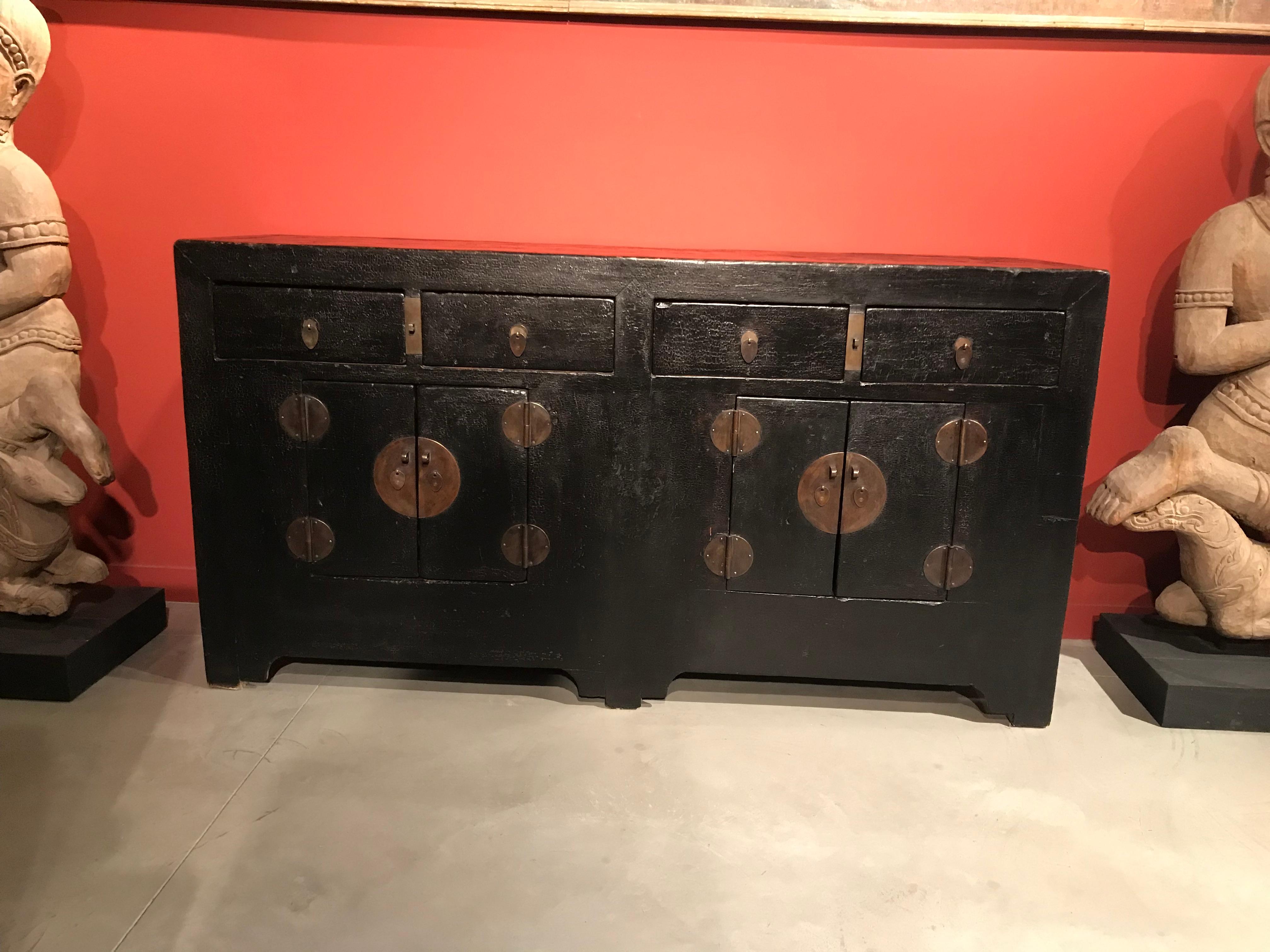 A classic antique Chinese sideboard with original hardware and plenty of storage space. A beautiful and practical piece. From Shanxi Province.
Dimensions: L: 70