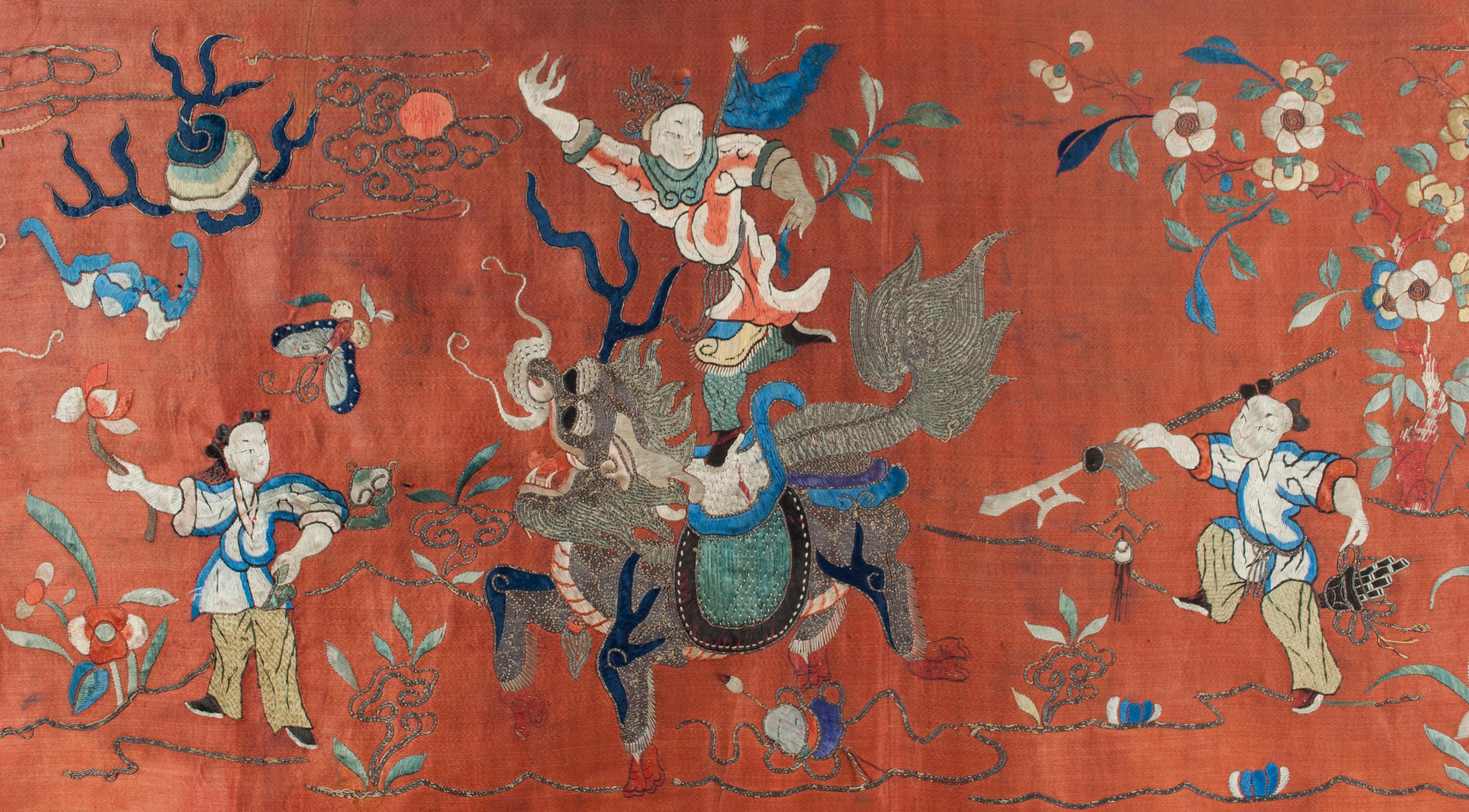 19th century Chinese silk embroidered banner or hanging

Mid 19th C banner depicting three auspicious animals, the Dragon, the Qilin and the Phoenix, all with riders, surround by attendants and other auspicious symbols in finely detailed