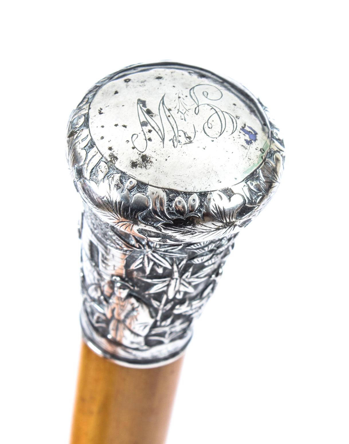 This is a beautiful antique Chinese gentleman's silver pommel walking stick, circa 1890 in date, the pommel initialled G.W..
 
It features an exquisite Chinese silver pommel decorated with immortals on clouds and figures in a wooded landscape. The
