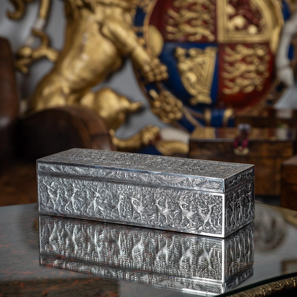 Antique late 19th Century rare Chinese export solid silver large casket made for the Thai market, crafted in an elongated rectangular form, the lid is intricately embossed with a scene from the Ramakien, a Thai rendition of the Hindu epic Ramayana.