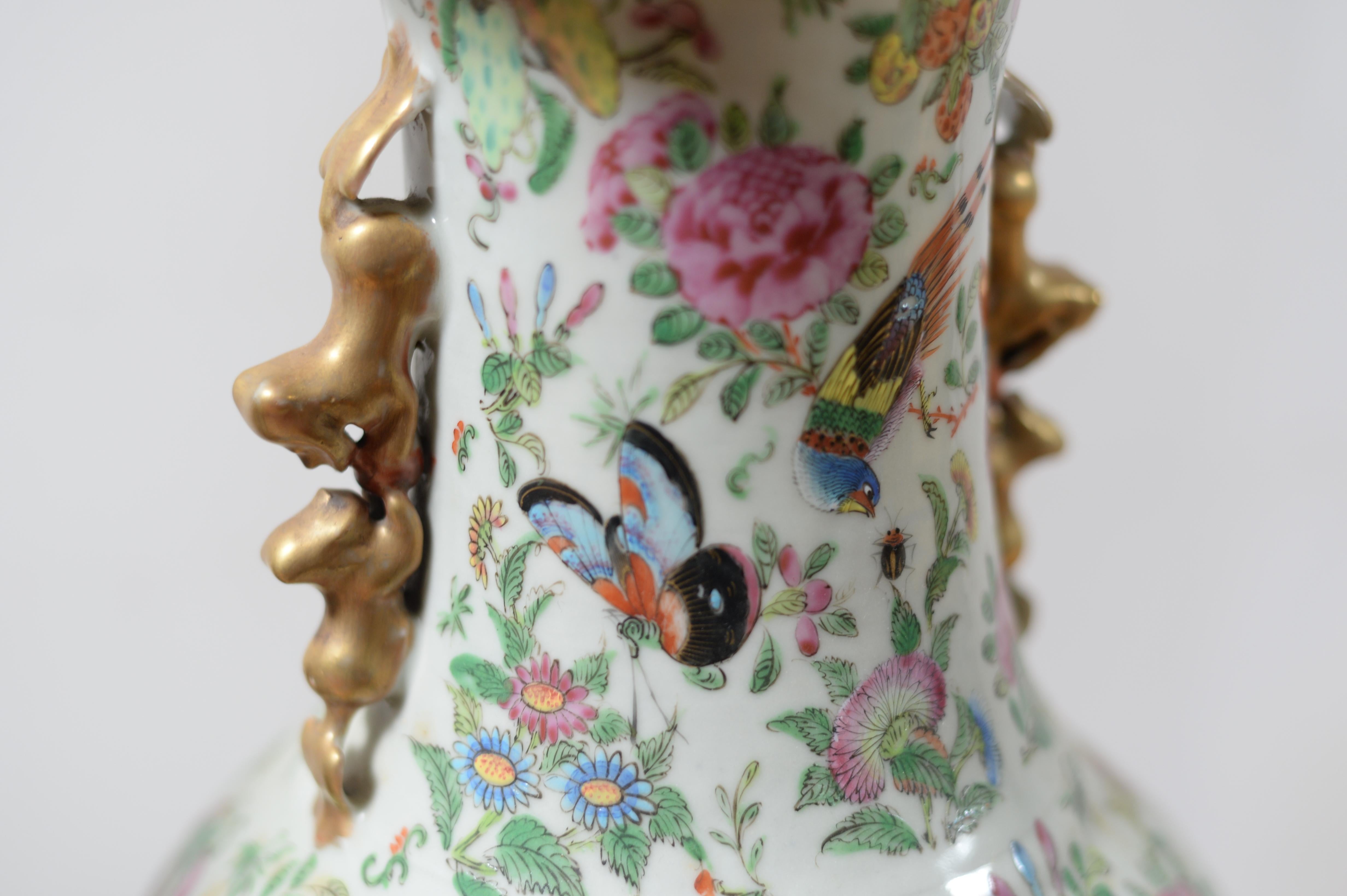 19th century Chinese vases, butterfly decor, flowers, birds, pink period, porcelain, no frail no chips in very good condition.
Measures: Diameter of the neck 22 cm, height 63 cm, 70 cm total height with the wooden base.