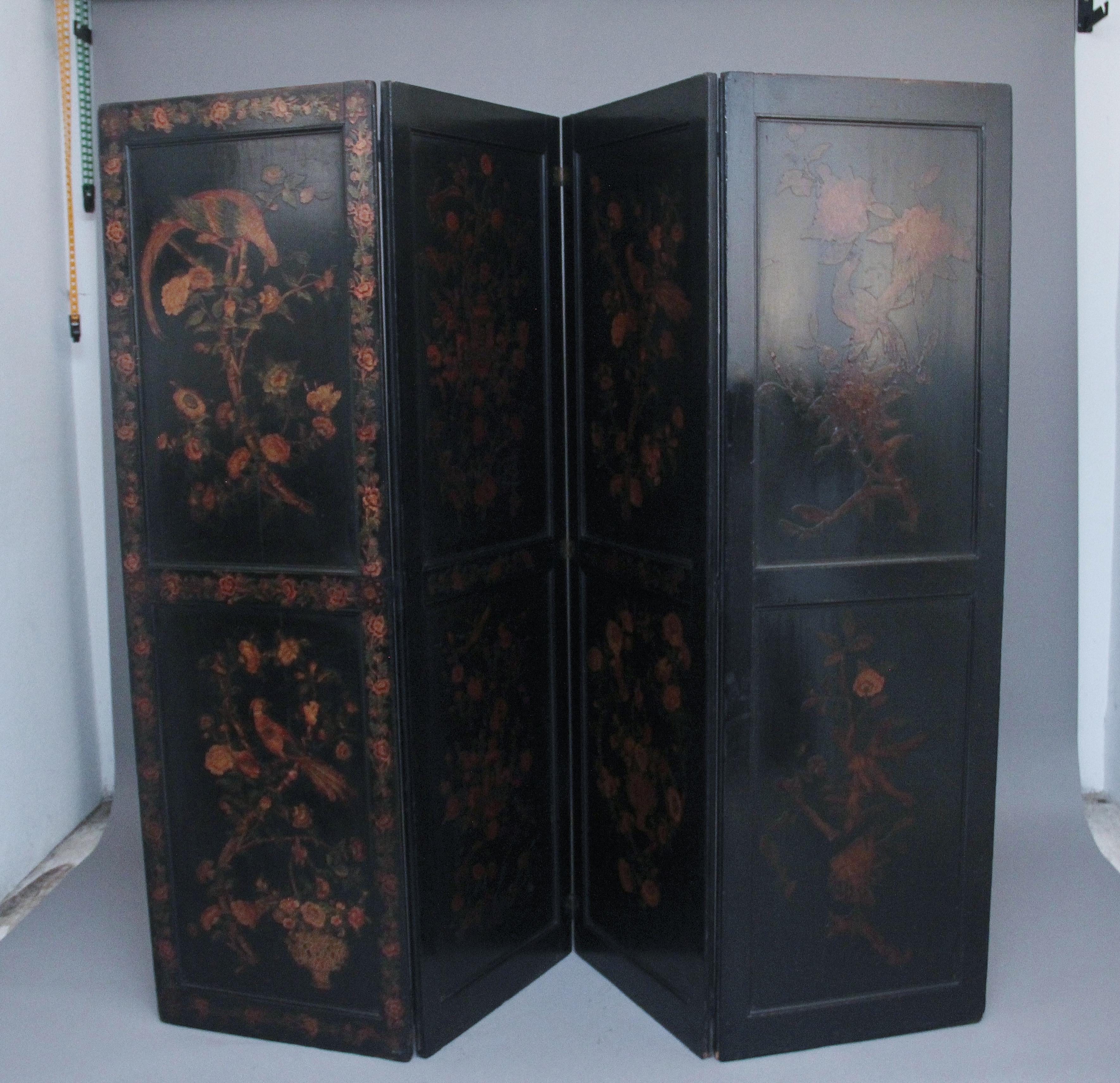19th Century chinoiserie and black lacquered four panel screen, the screen has two panels on each of the four panels, and each panel depicts various birds and foliage, all in very good condition and highly decorative. The screen has hinges on each