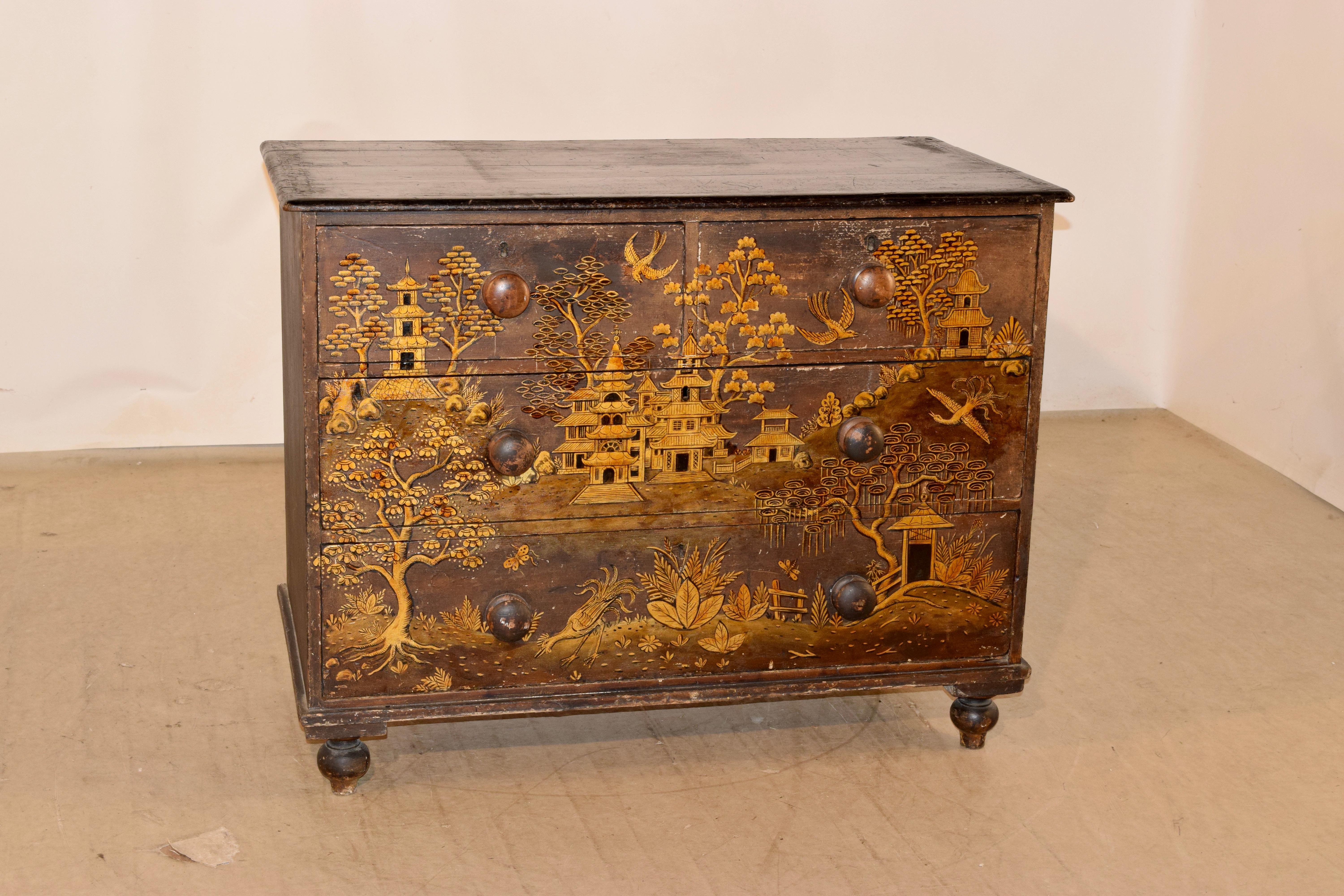 19th century English pine chest of drawers with hand painted chinoiserie decoration. The top has a molded edge and follows down to two small drawers over two larger drawers, all with hand painted chinoiserie decoration. The sides are simple and the