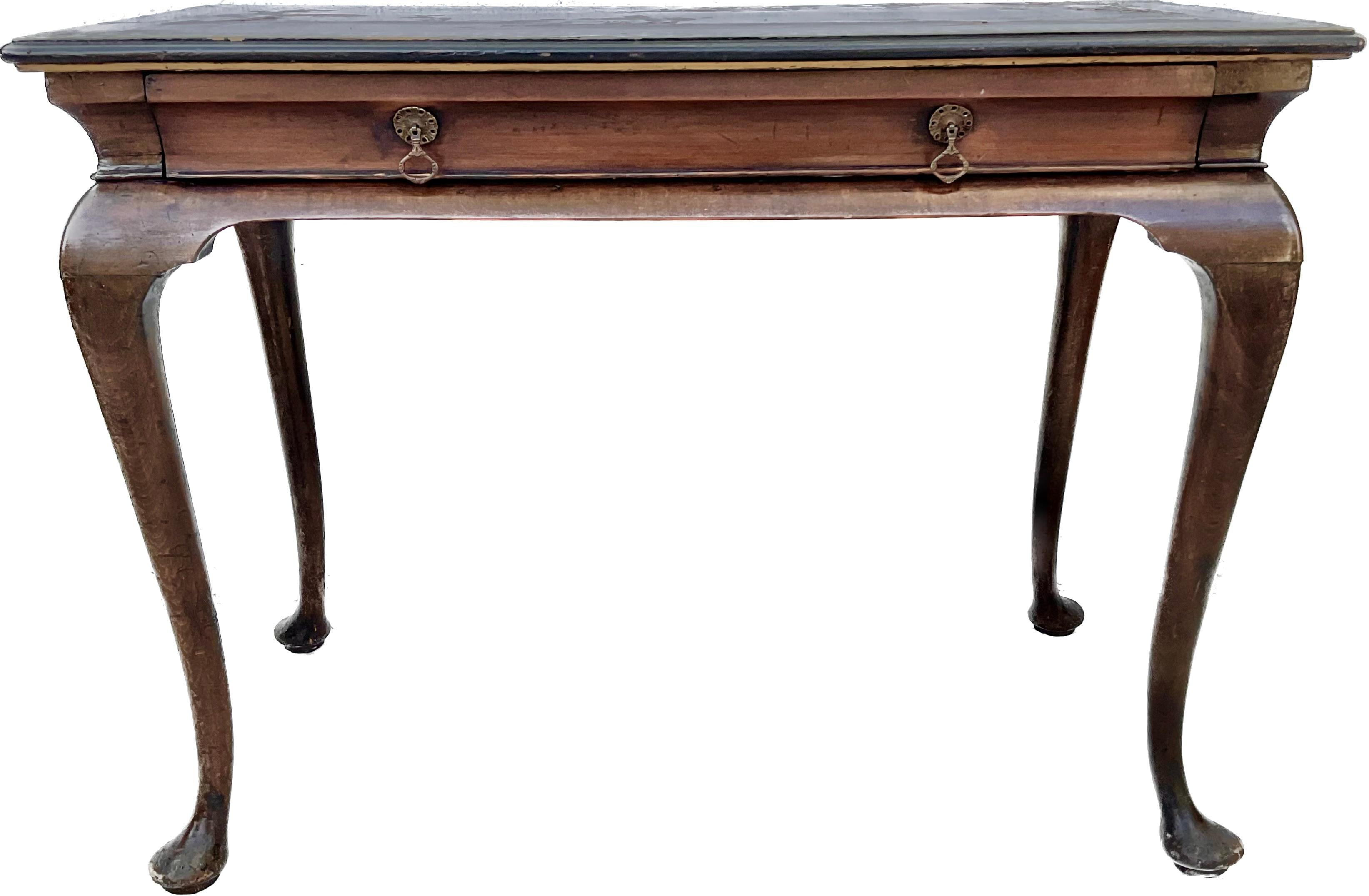 19th century chinoiserie decorated table. Carved and painted raised chinoiserie decorated top, cabriole legs with pad feet. Can be used as a center table, console table, writing or sofa table. Has one drawer.