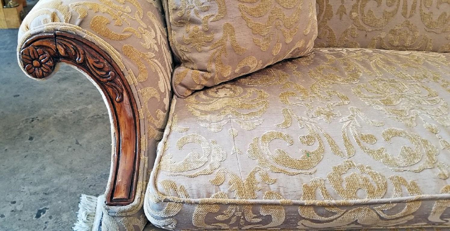 Presenting a gorgeous early 19th century Chippendale style camel back sofa possibly made in Louisiana.
From circa 1820 this sofa is in the classic Chippendale camel back style with gorgeous carving and detail on the wood.

Made of blonde walnut,