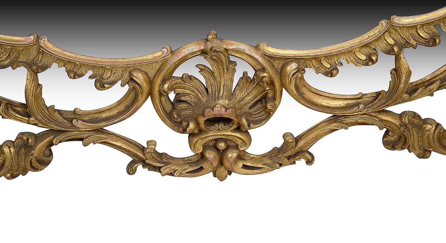English 19th Century Chippendale style gilded wall mirror. For Sale