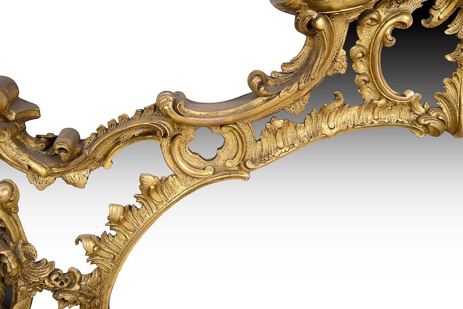 Gesso 19th Century Chippendale style gilded wall mirror. For Sale