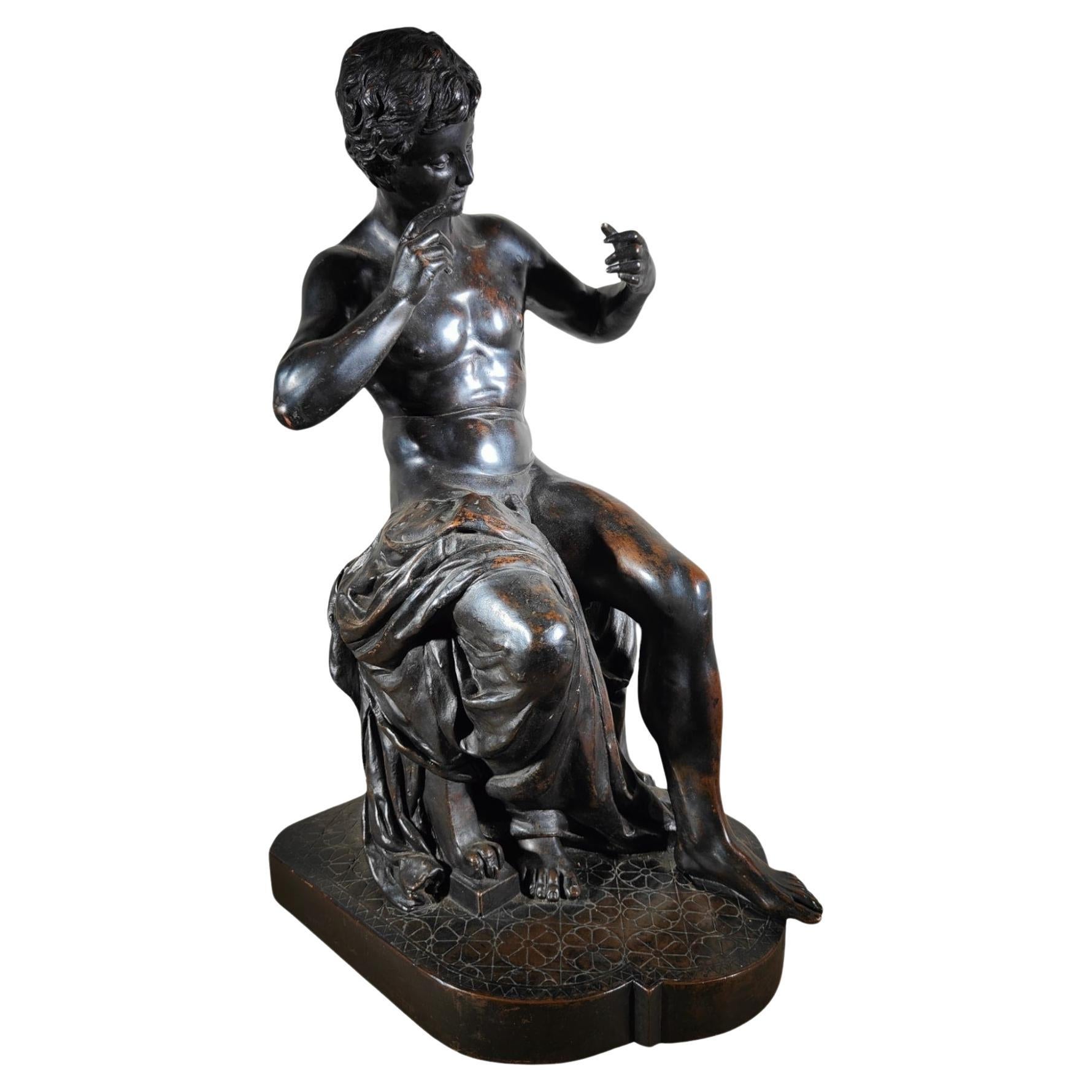 19th Century Classic Sculpture: Youth Seated in Dark Patinated Copper