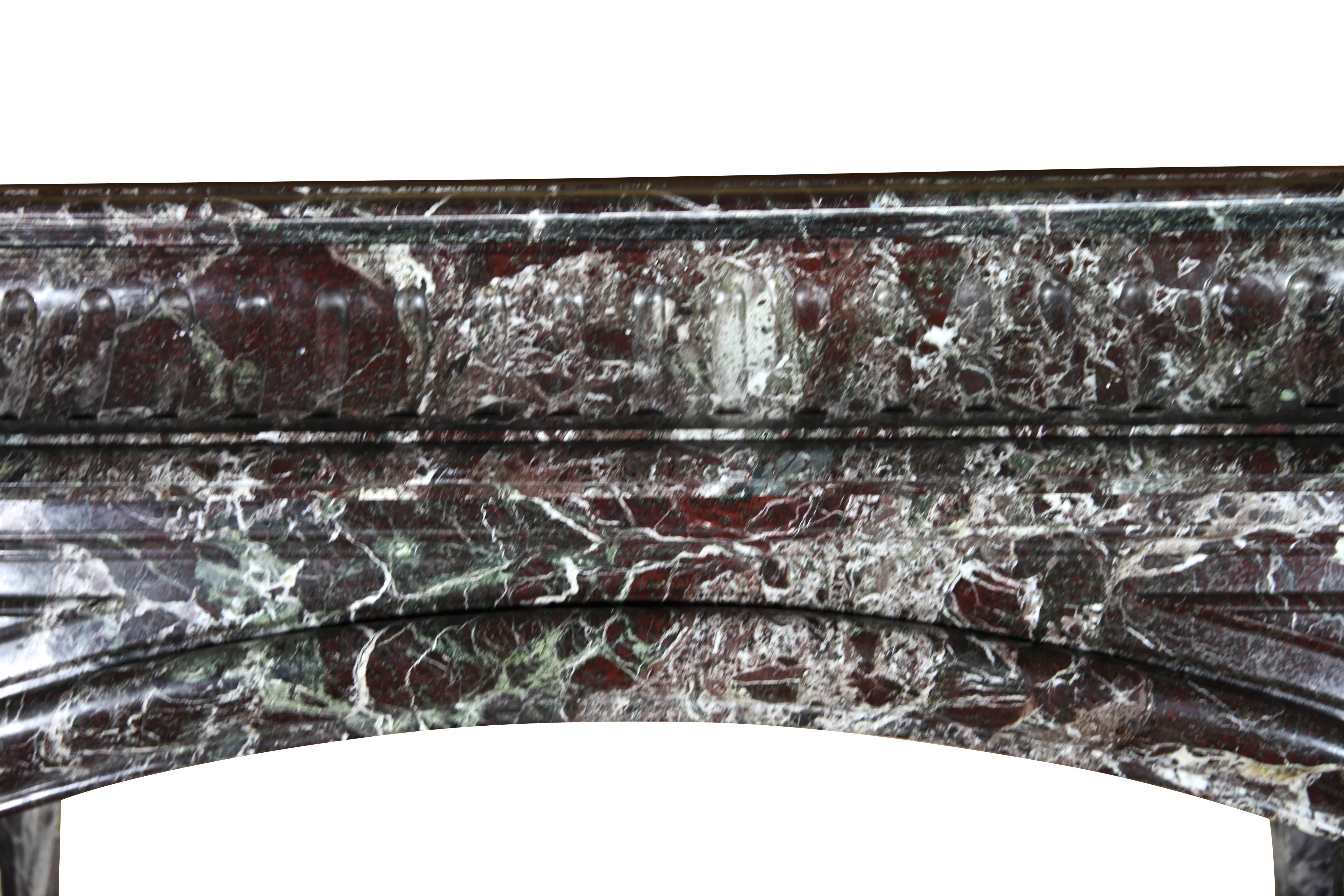 This antique Louis XIV style fireplace chimney piece was made during the 19th century in a red, green marble from the south of France.
Measures:
150 cm EW 59.06