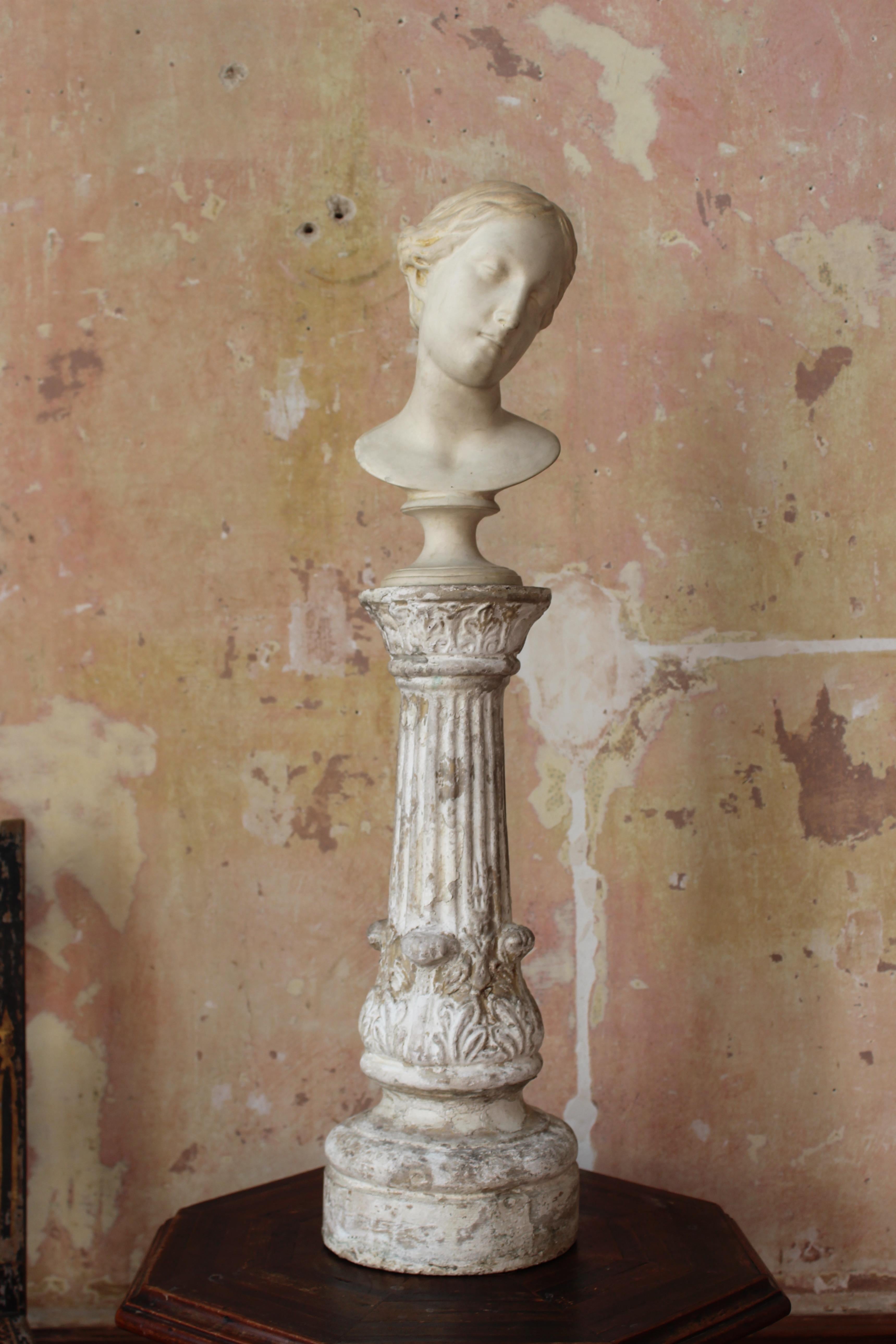 A finely cast 19th century plaster classical library bust, on socle base on a later period plaster column. 

Instinctively stamped CTS??, age related discolouration with some minor nibbles. 

The bust does come of the later column 

83cm in height