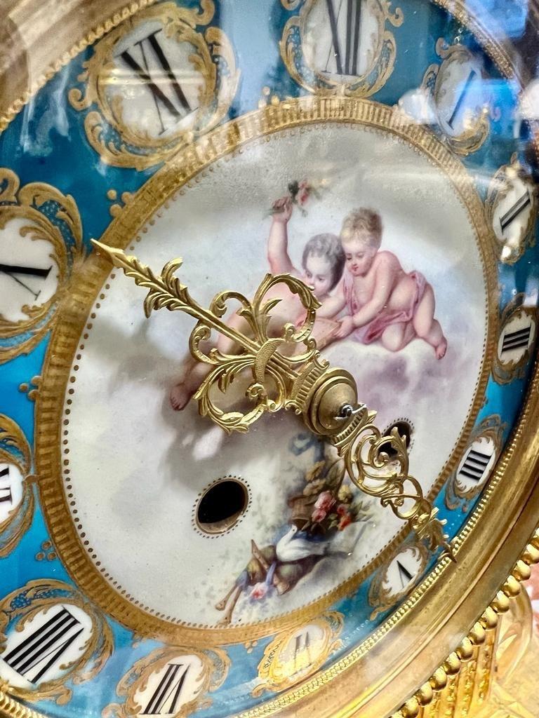 French 19th Century Clock in Gilt Bronze with a Porcelain Plate from Sévres For Sale
