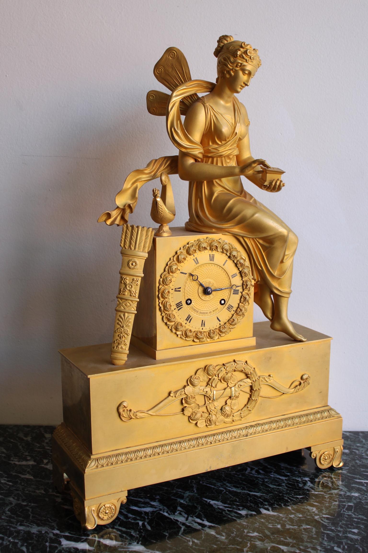 19th century gilt bronze clock depicting a woman with Pandora 's box.
In good condition.
Dial signed 