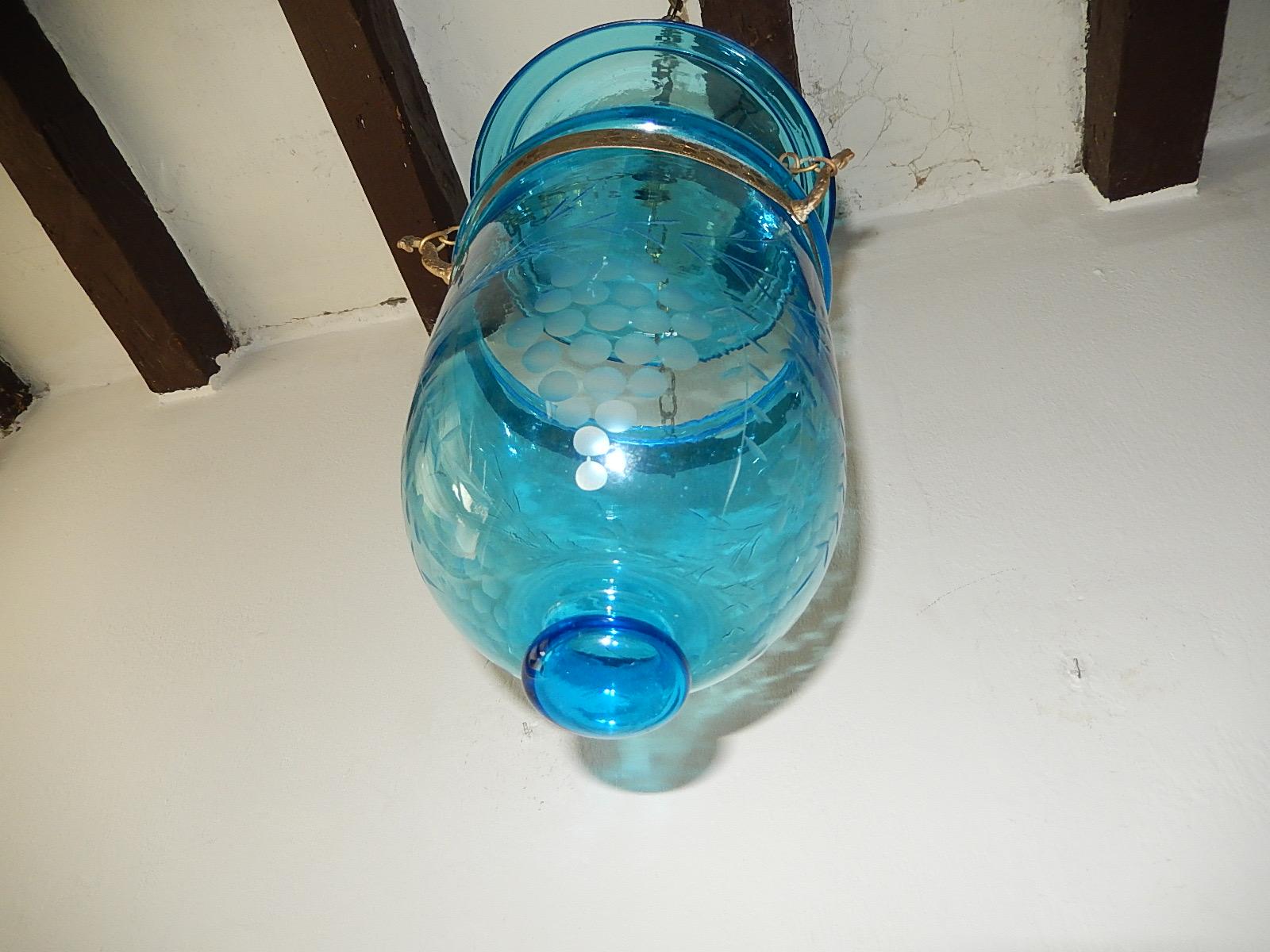 Rare cobalt color. This is 1 of 2 of matching bell jars. This one has a crack on lid and chips on lip. Price reflects this. Made for candles, but will be wired with one big socket. Bronze details. The bell alone measures 9.5 inches. The top alone