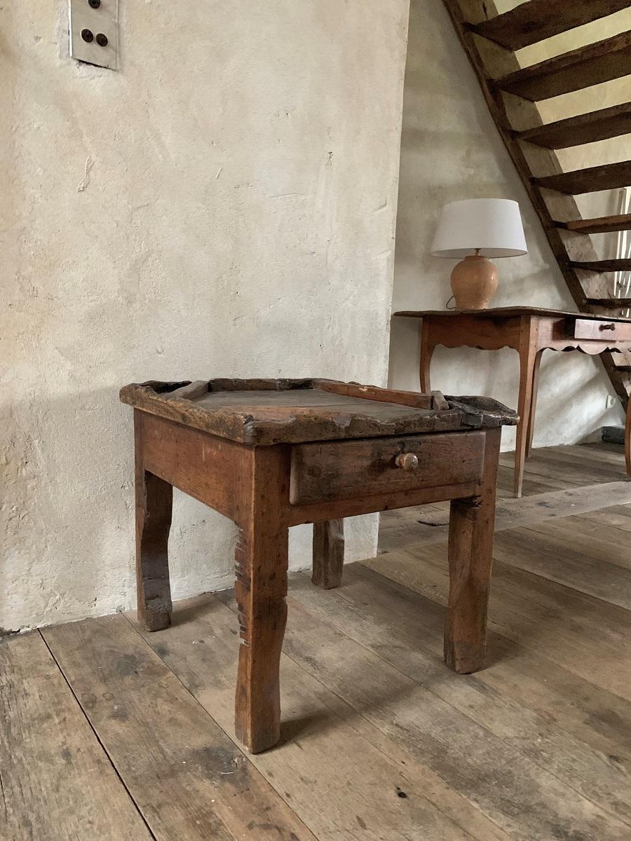 A great little cobblers worktable with drawer in pine. Two centuries of intensive use has given it a fabulous patina and color. We conserved this entirely and reinforced the structure so it is now very sturdy indeed.