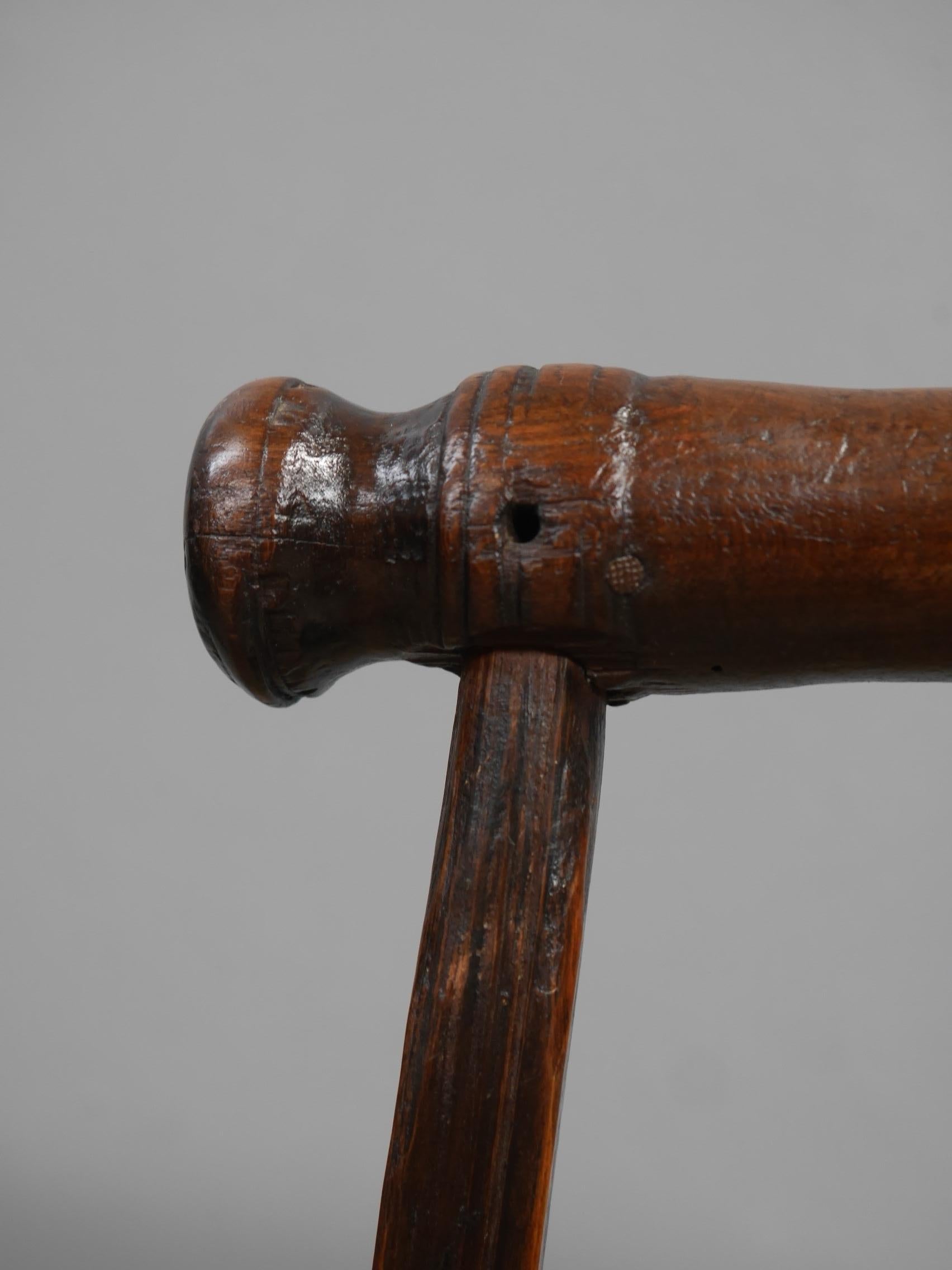 An early antique cock fighting stand.
A beautiful, very unusual & scarce surviving piece of folk art of excellent form, with interesting if slightly macabre provenance. 
In mixed hardwood, the hand-turned perch is supported by three legs above a