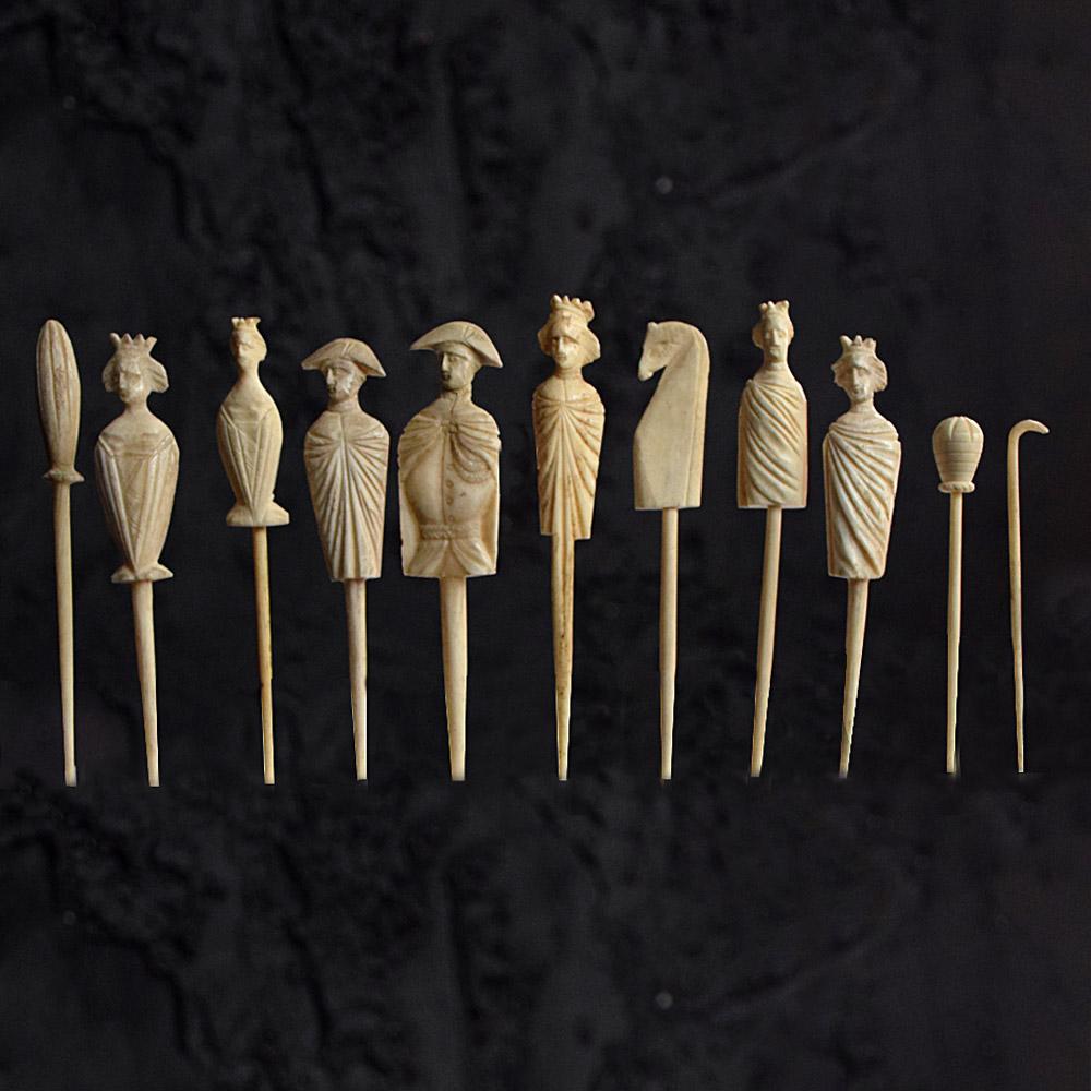 19th century collection of French carved bone spillikins 

A small collection of 19th century French carved bone spillikins or sand set pieces Dieppe. Comprising of eleven hand carved pieces including kings, queens, horse, and turrets, circa 1850.