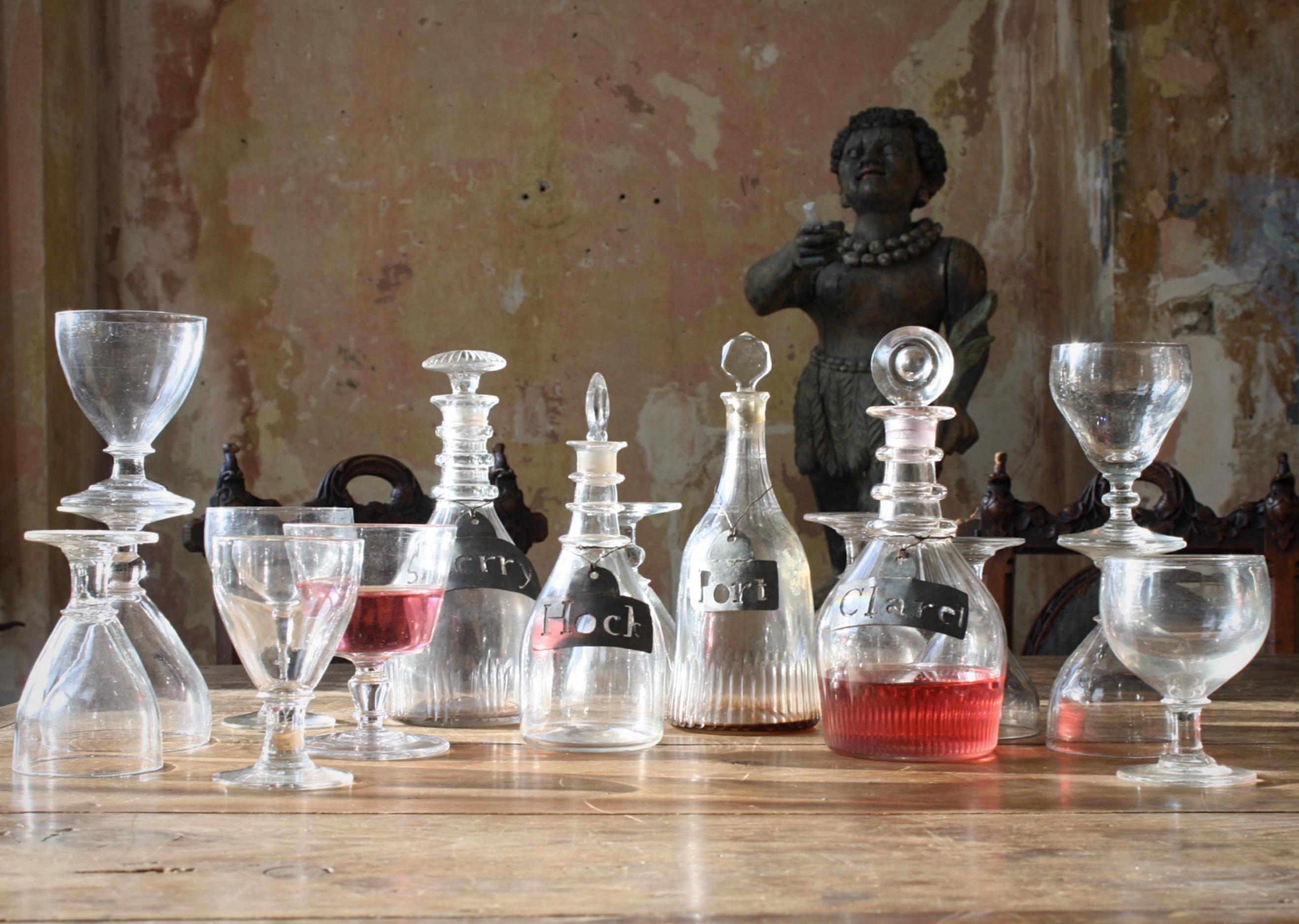 A good and decorative collection of twelve assorted early 19th century rummers, and four decanters.

All in good condition, some very minor nibbles around the bases, no cracks.

Some discolouration to one of the decanters around the base from