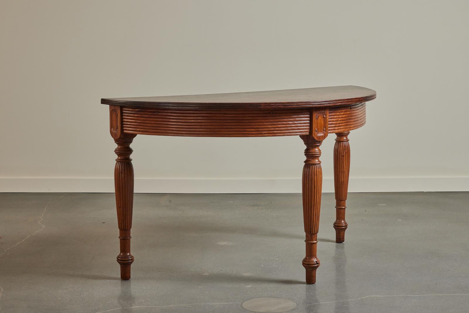Teak 19th Century Colonial demilune Table from Indonesia