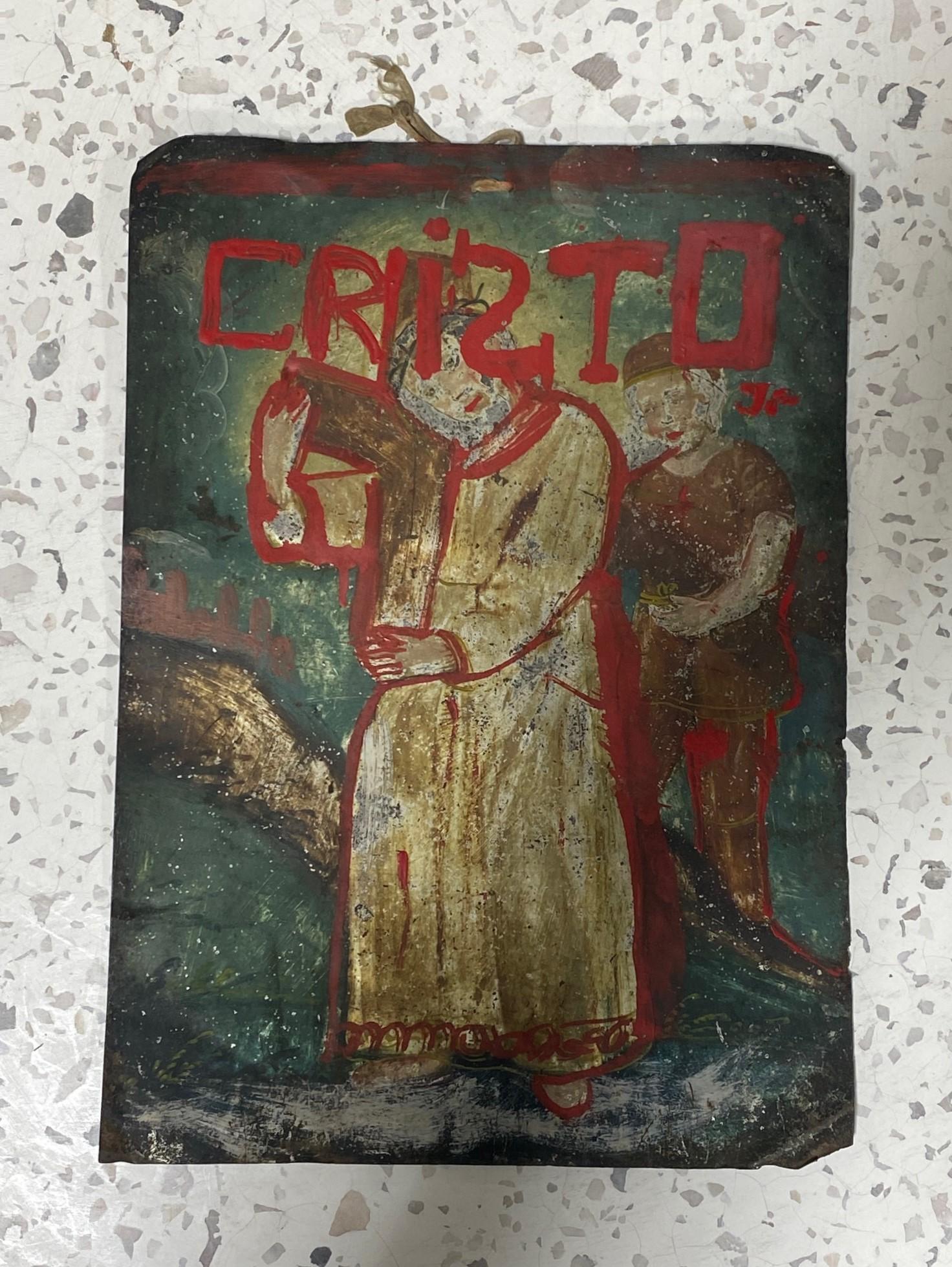 A beautiful 19th century Colonial Mexico folk art religious original retablo devotional painting of the Catholic Christ bearing the cross before the crucifixion. 

The piece is likely from a collection as it has an accession number on the verso as