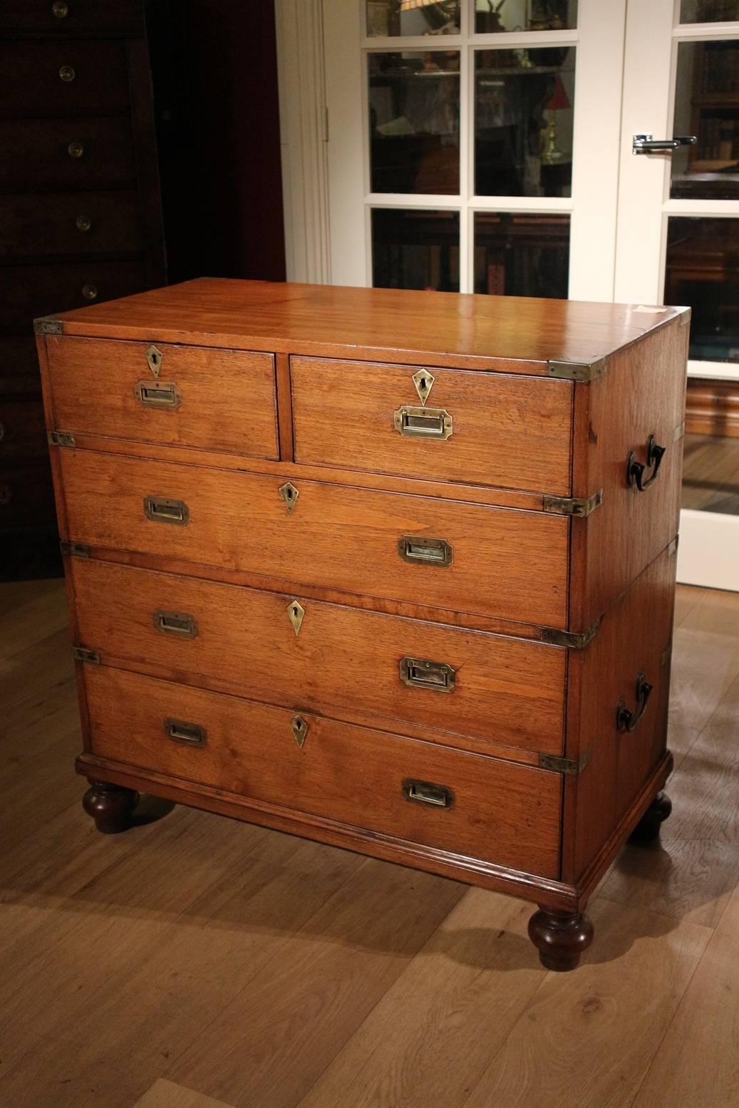 Here we have a fine small military chest. The chest is made in two sections for the ease of transportation, either by sea or pack horse and mule.
This particular chest would have been made for an officer for Campaign.
The chest of drawers has the