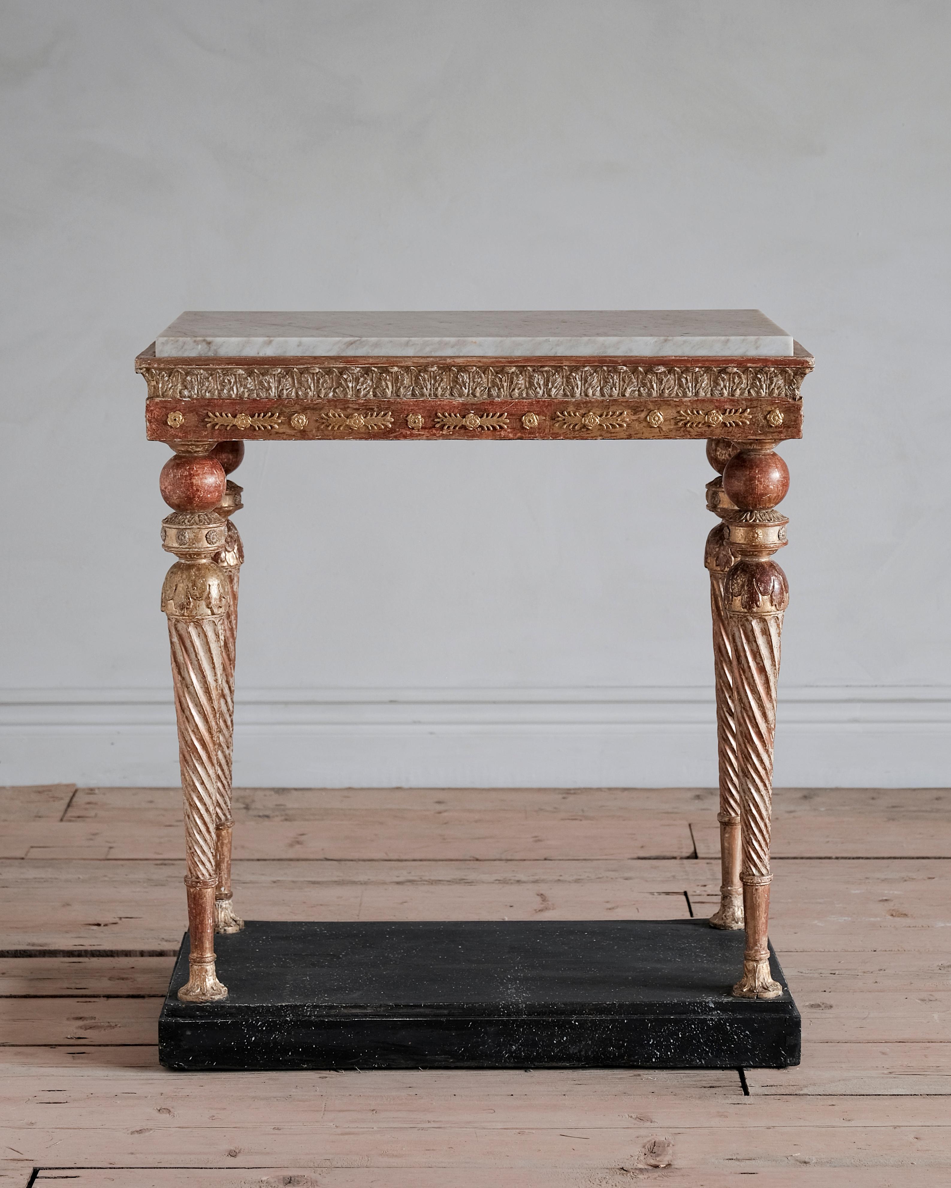 Fine late Gustavian / early Empire giltwood console table with Carrara marble top. Stockholm, circa 1810.