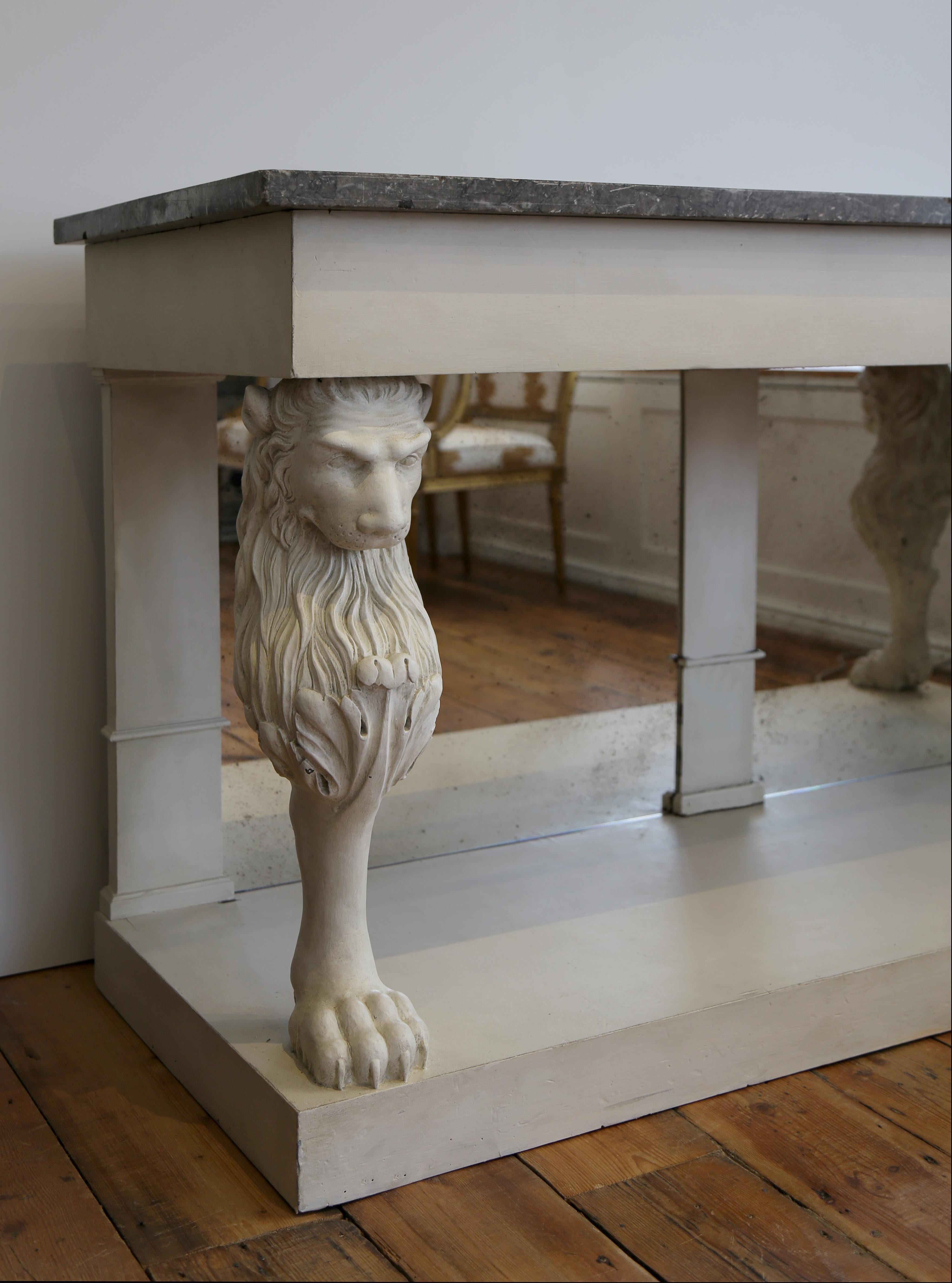 Hand painted 19th C console with carved wooden supports, marble top and newly fitted mirror.