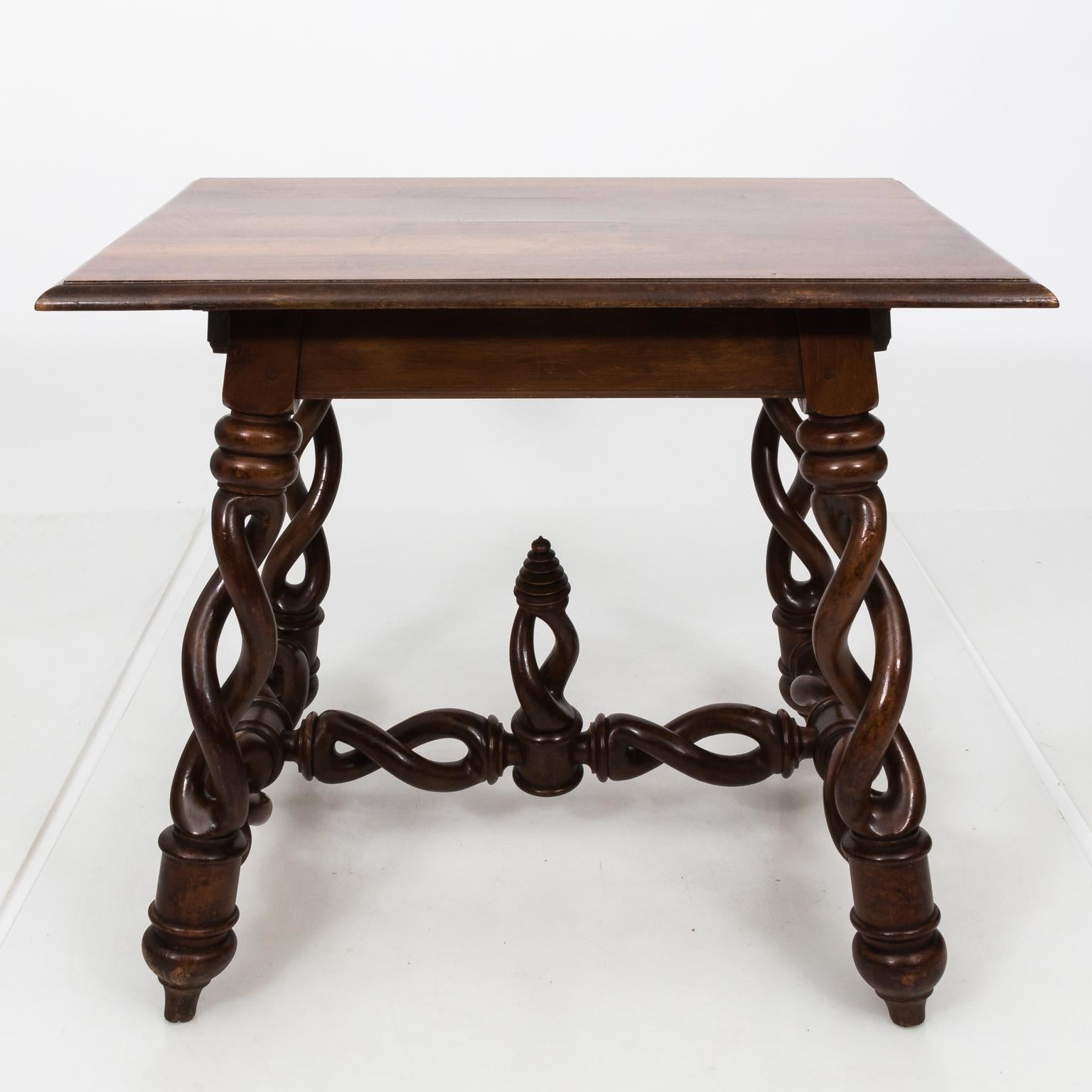 19th century Continental style loose barley twist table with centre pointed finial.
 