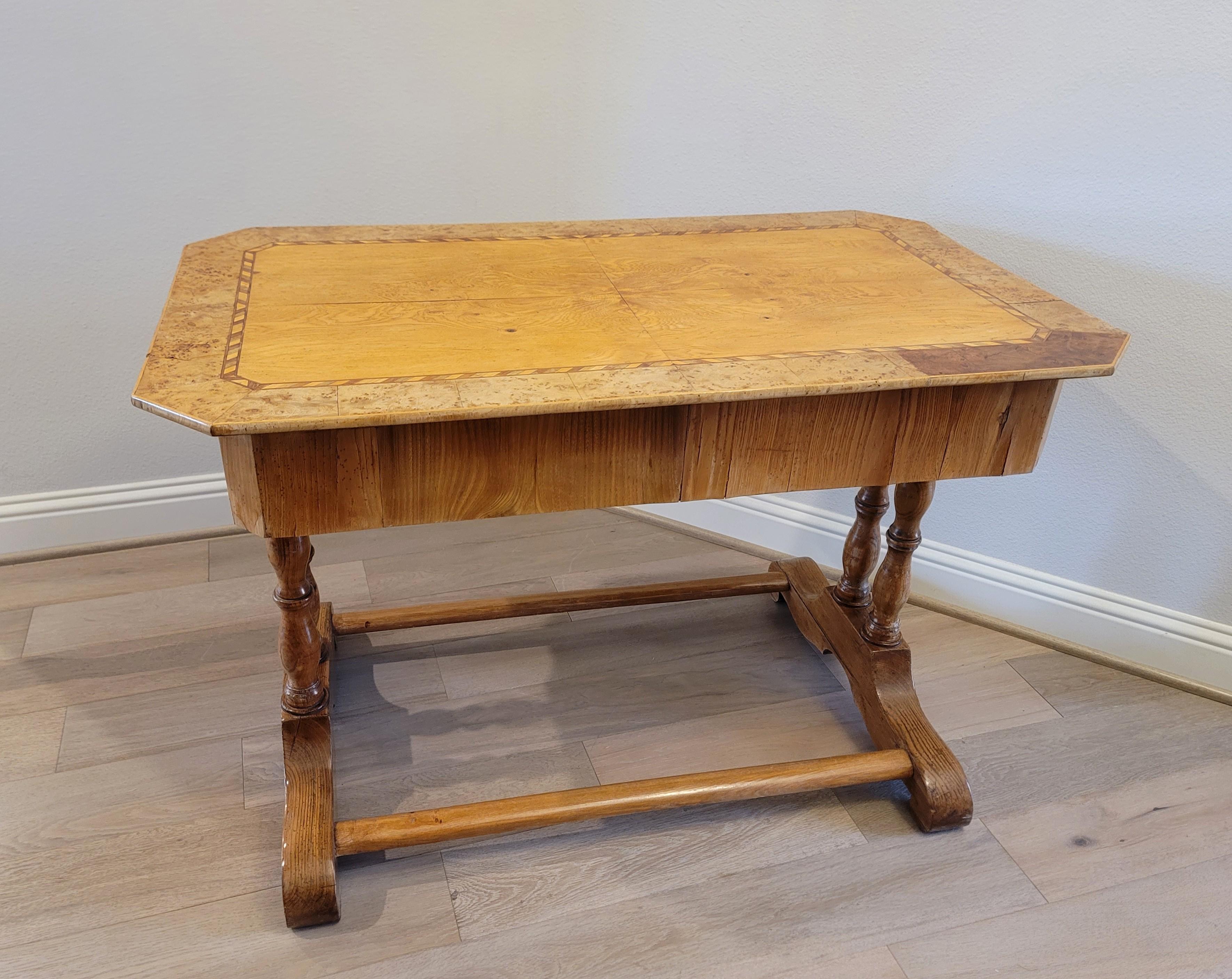 A scarce elegant and most distinctive Biedermeier Period (1815-1848) highly figured maple table.

Hand-made in Continental Europe in the early/mid-19th century, understated elegance and utilitarian design, this nearly 200 year old table is