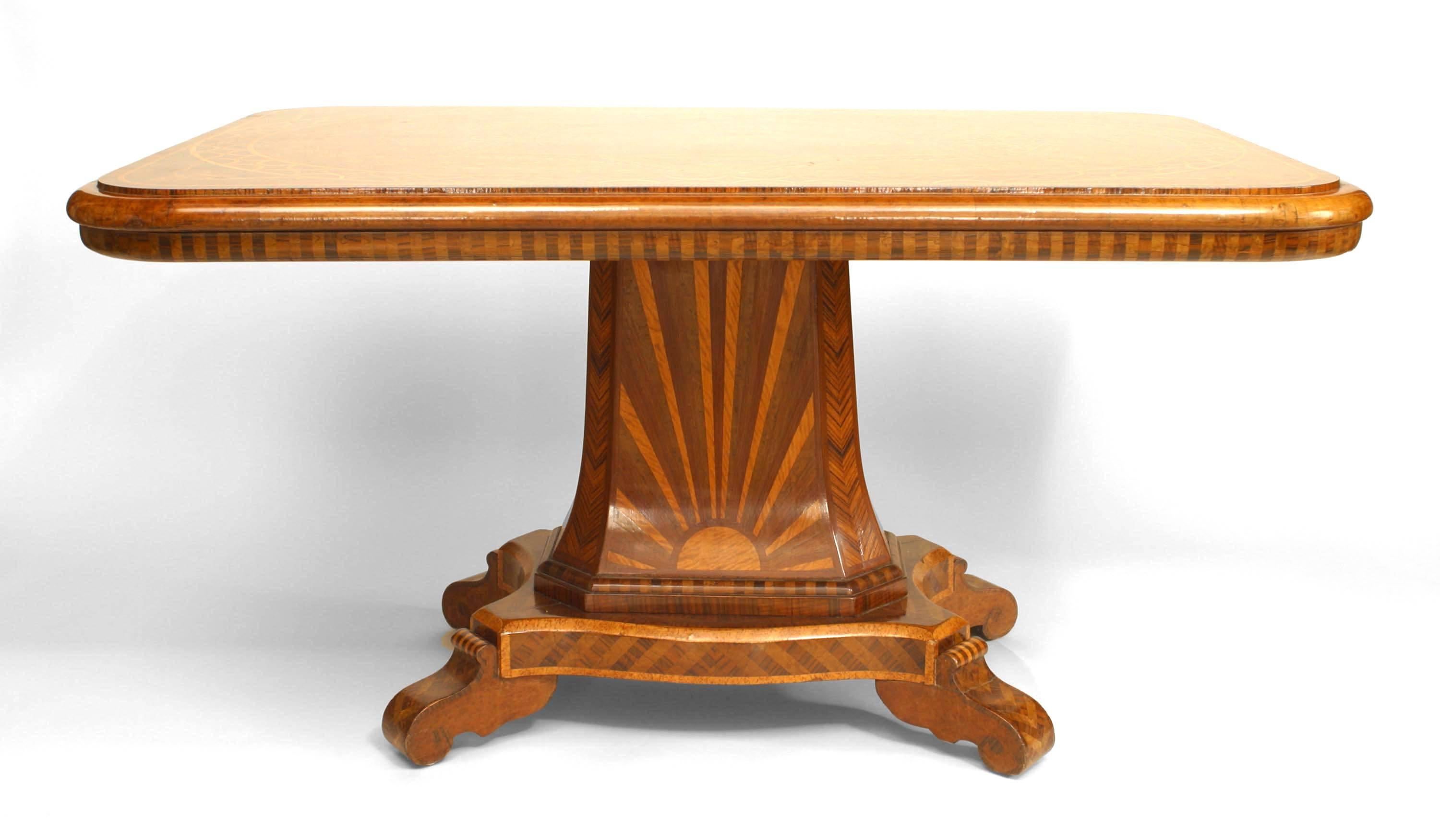 Continental German (circa 1825) rectangular pedestal base center table inlaid with various woods and top with an urn design within a border.
